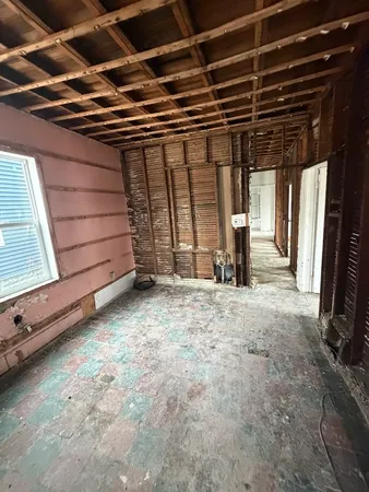 a view of under construction room and staircase