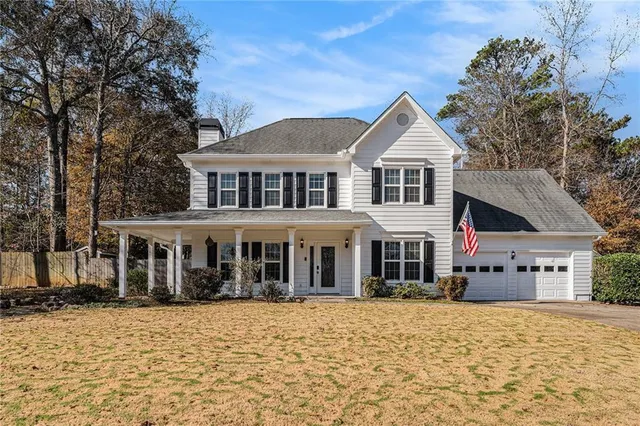 front view of a house with a yard