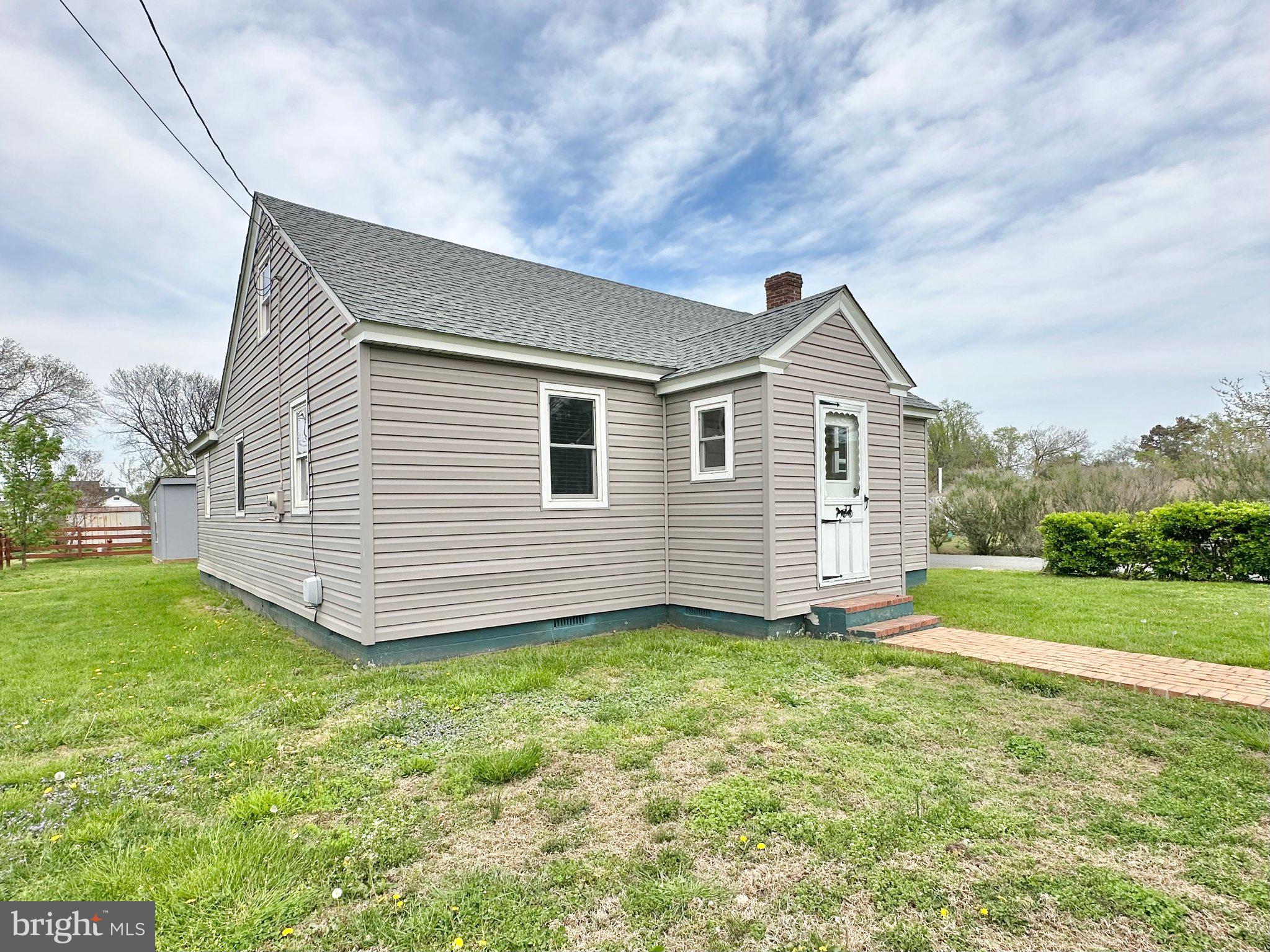 21530 Coopertown Road Tilghman, MD 21671 - Photo 2 of 17 Charming home with inviting curb appeal.