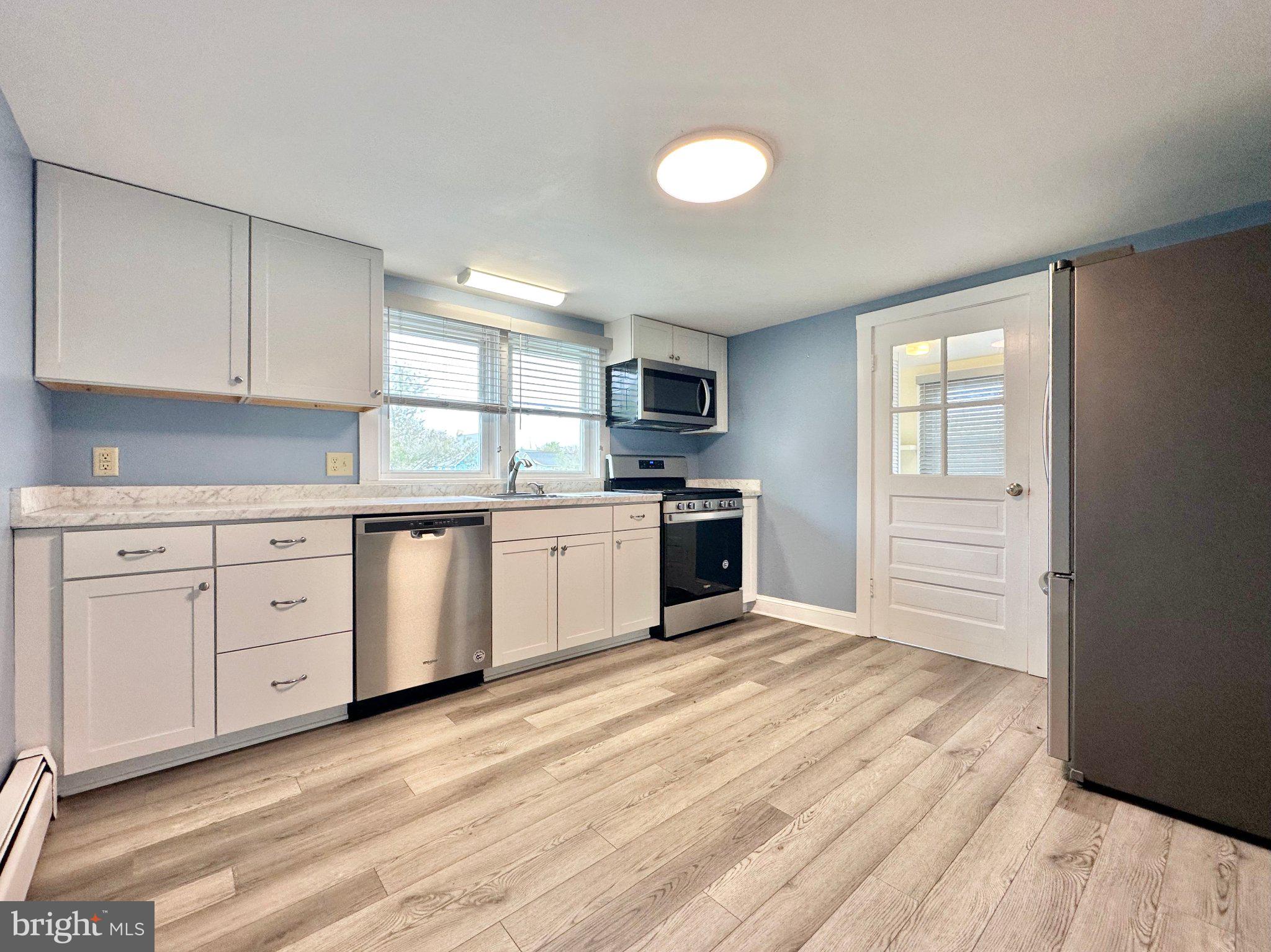 21530 Coopertown Road Tilghman, MD 21671 - Photo 5 of 17 Bright and modern kitchen space.