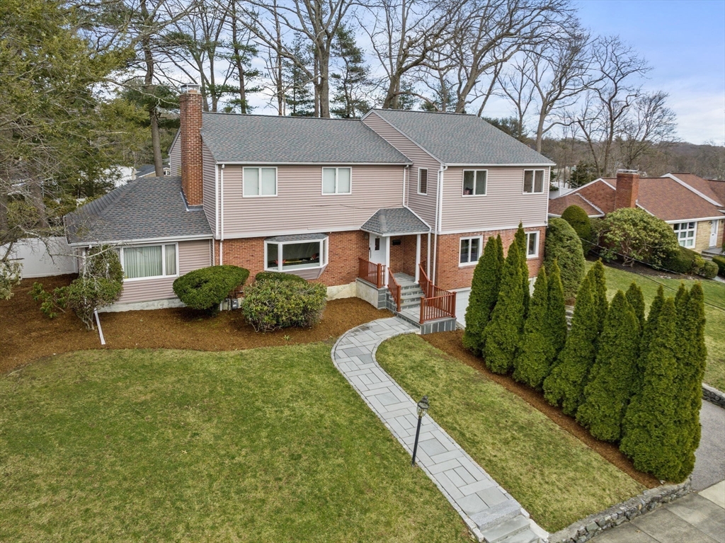 12 Dorothy Road Newton, MA 02459 - Photo 1 of 1 a front view of a house with a yard