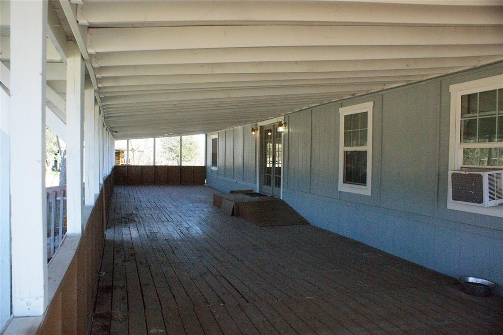 7424 North Locust Street Denton, TX 76207 - Photo 2 of 9 a view of gallery with wooden floor