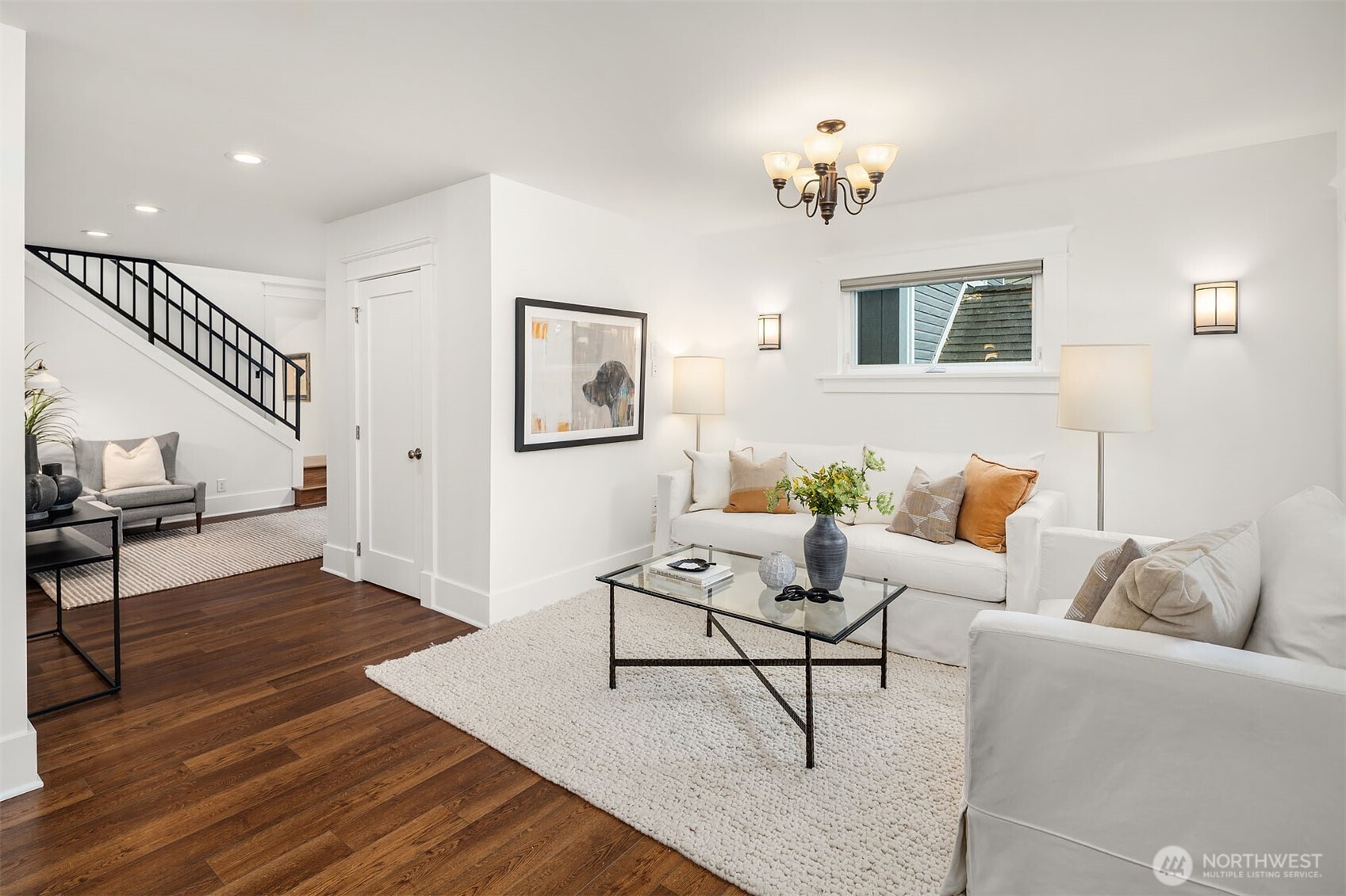 519 27th Avenue Seattle, WA 98122 - Photo 4 of 38 a living room with furniture and a chandelier