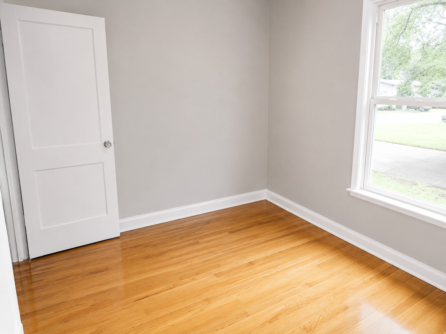 907 East 56th Street Austin, TX 78751 - Photo 12 of 13 a view of empty room with wooden floor and fan