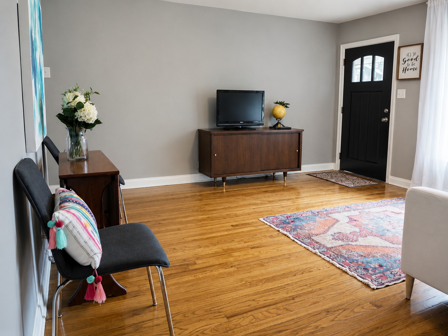 907 East 56th Street Austin, TX 78751 - Photo 6 of 13 a living room with furniture and a flat screen tv