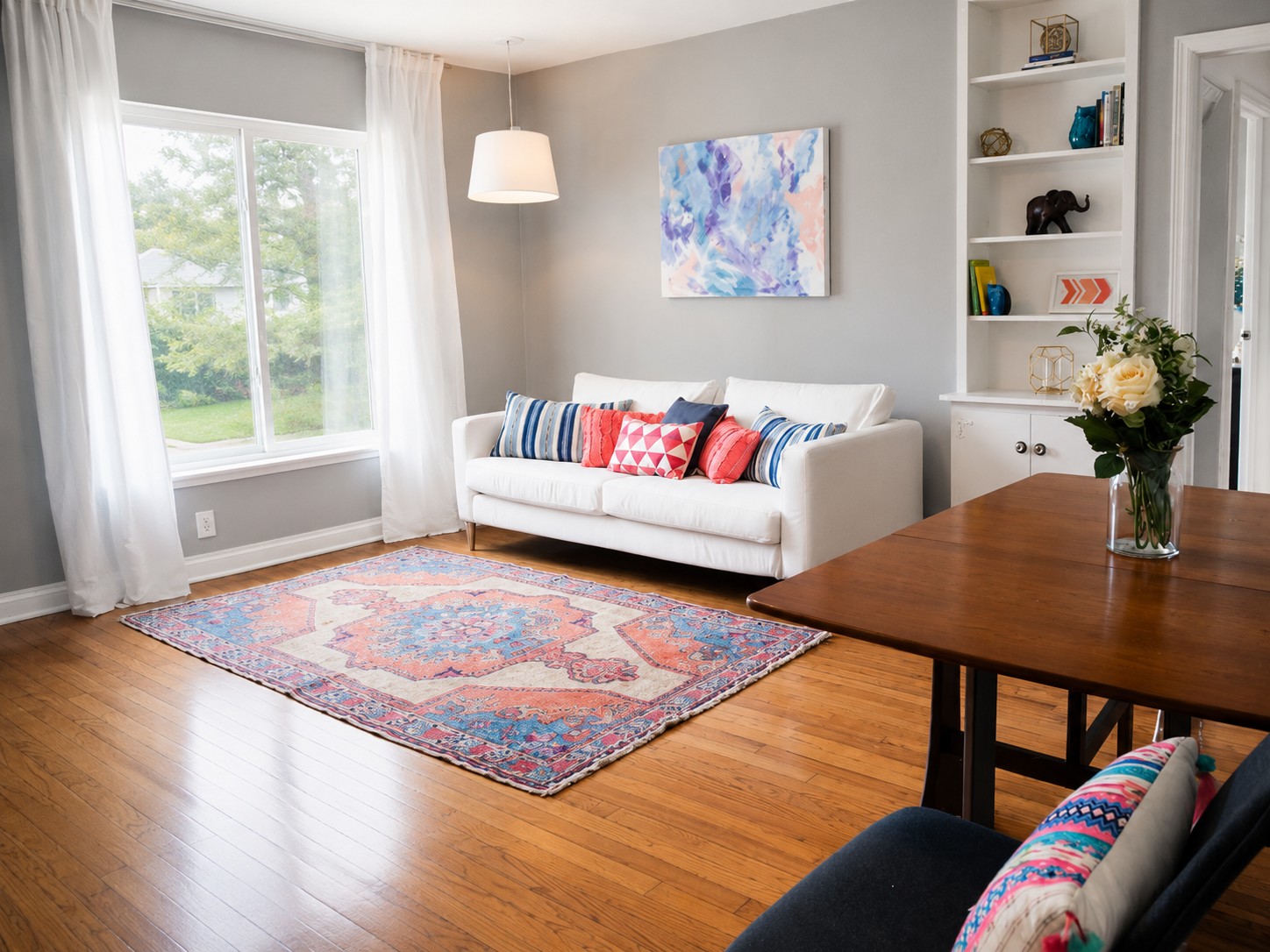 907 East 56th Street Austin, TX 78751 - Photo 7 of 13 a living room with furniture and a rug
