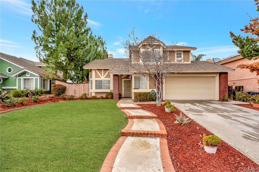 9231 Middlefield Drive Riverside, CA 92508 - Photo 1 of 1 a front view of a house with a yard