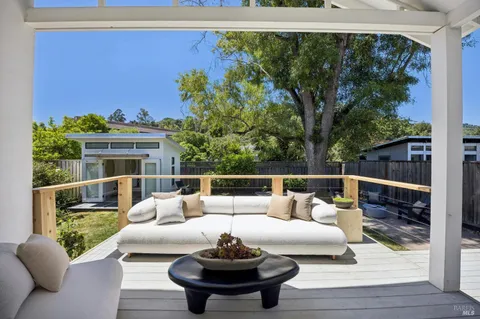 a building outdoor space with patio furniture