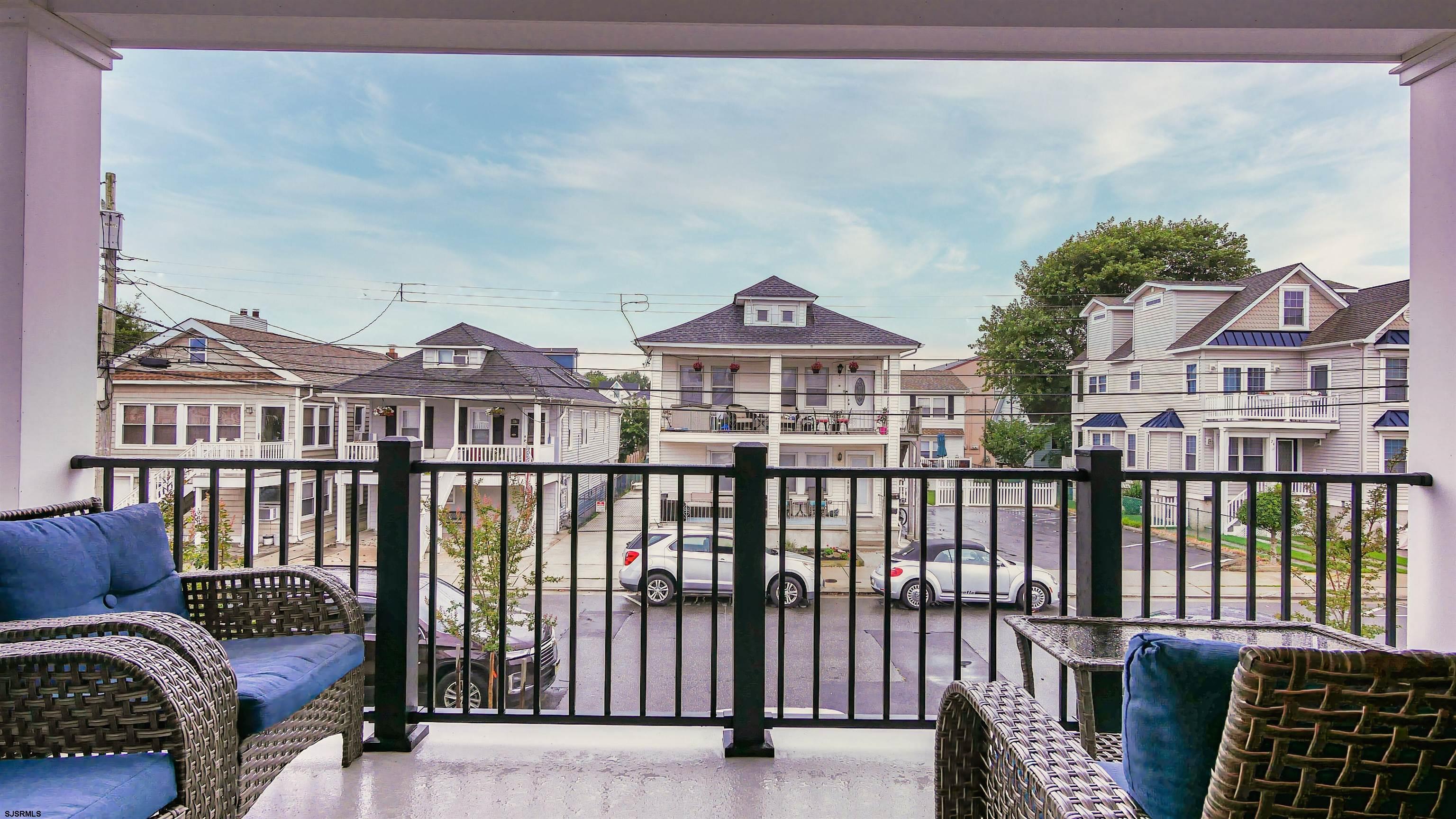 15 North Jefferson Avenue, Unit B Margate City, NJ 08402 - Photo 6 of 13 a view of a city from a balcony