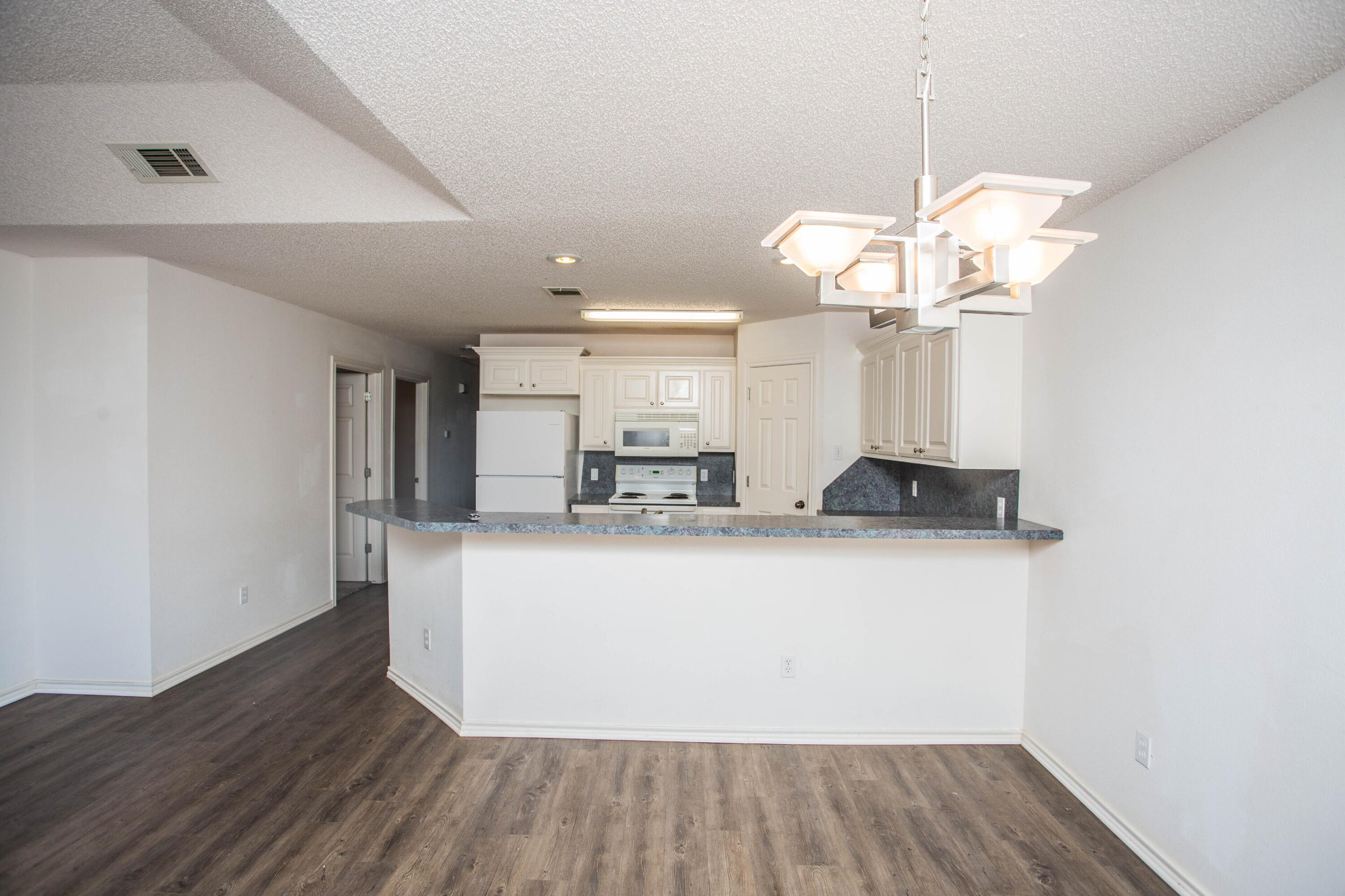 3114 111th Street Lubbock, TX 79423 - Photo 8 of 26 a view of kitchen and sink