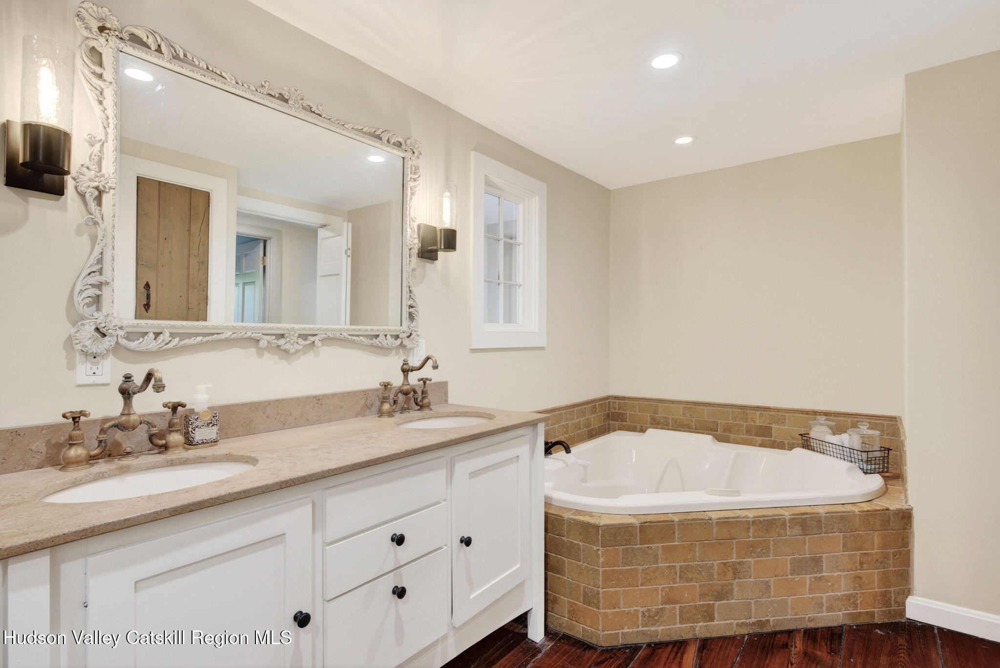 1429 Jackson Corners Road Red Hook, NY 12571 - Photo 23 of 59 a bathroom with a granite countertop sink and a mirror
