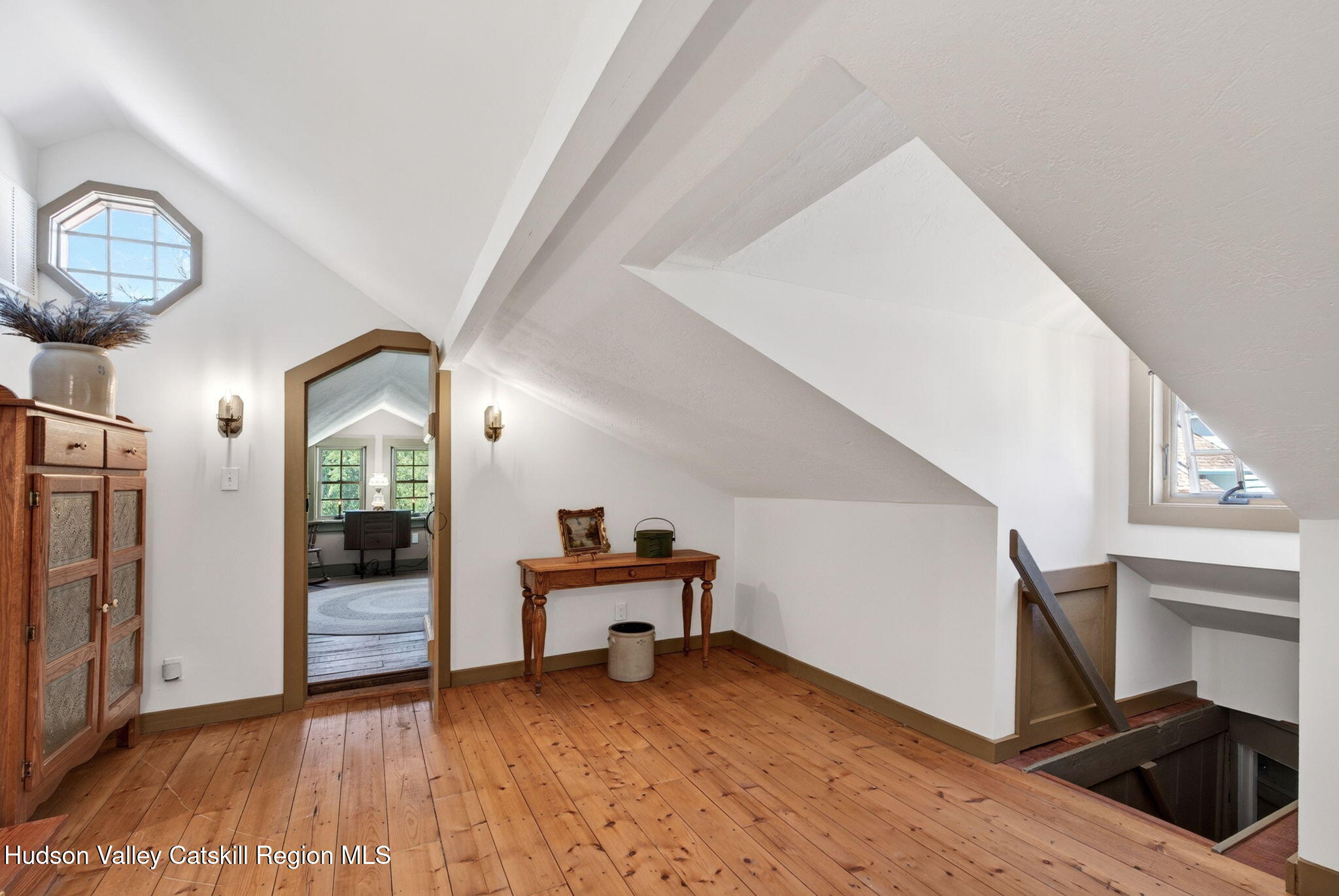 1429 Jackson Corners Road Red Hook, NY 12571 - Photo 24 of 59 a view of a hallway with entryway wooden floor and dining room view