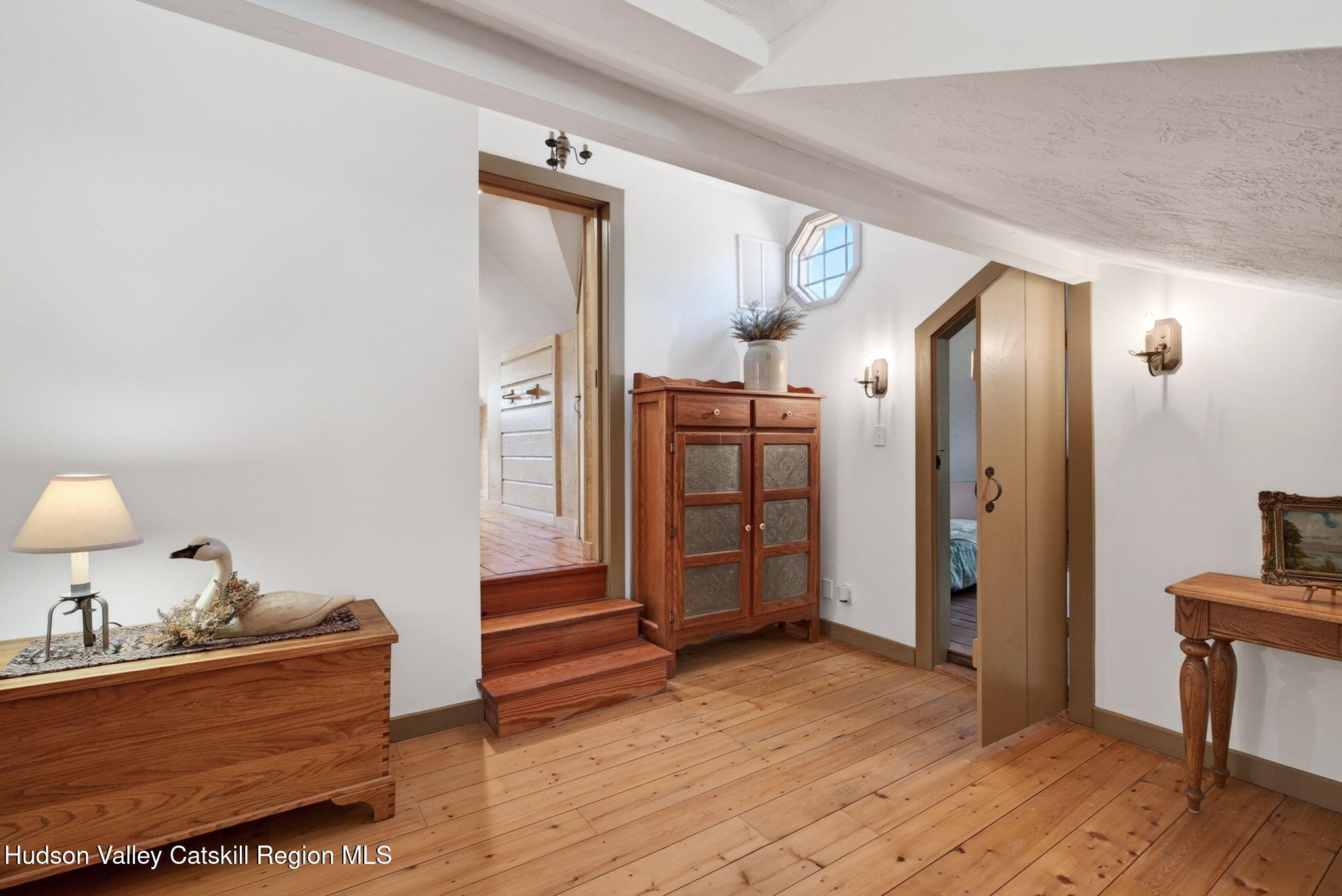 1429 Jackson Corners Road Red Hook, NY 12571 - Photo 25 of 59 a view of a livingroom with furniture and wooden floor