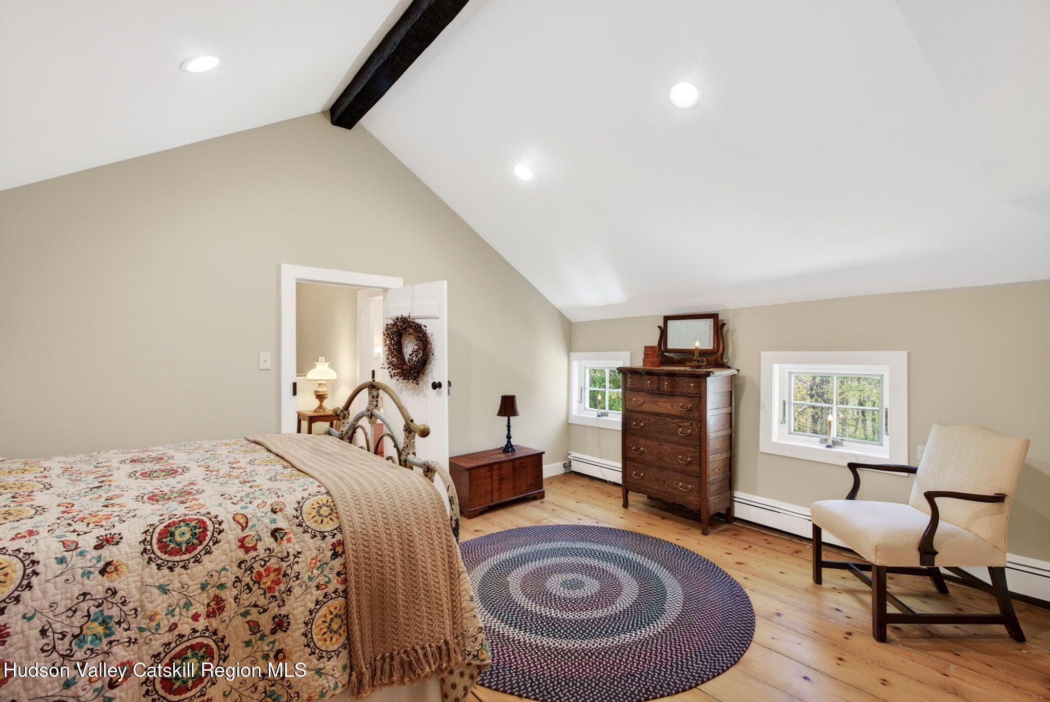 1429 Jackson Corners Road Red Hook, NY 12571 - Photo 27 of 59 a bedroom with a bed and a couch