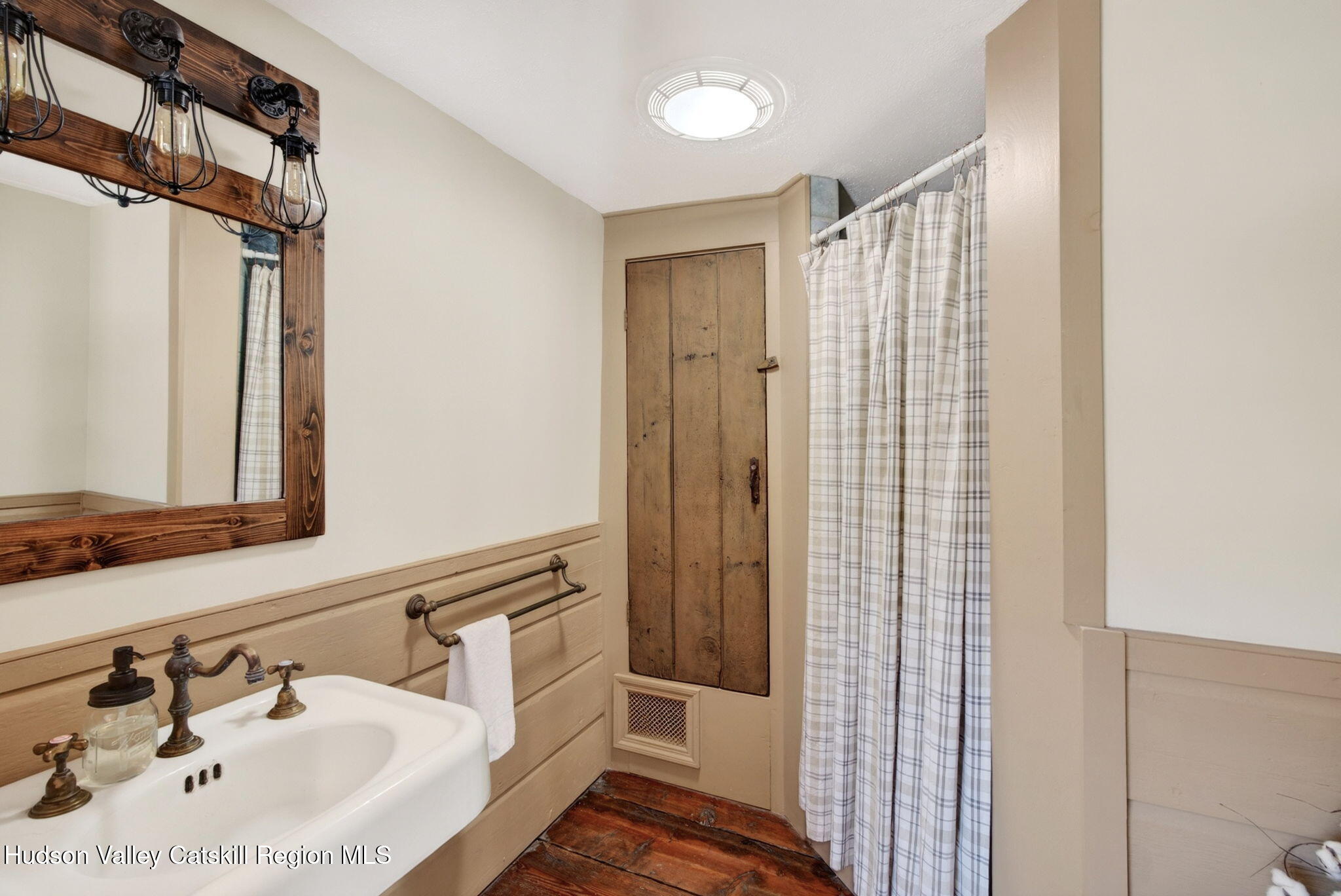 1429 Jackson Corners Road Red Hook, NY 12571 - Photo 28 of 59 a bathroom with a sink and a mirror