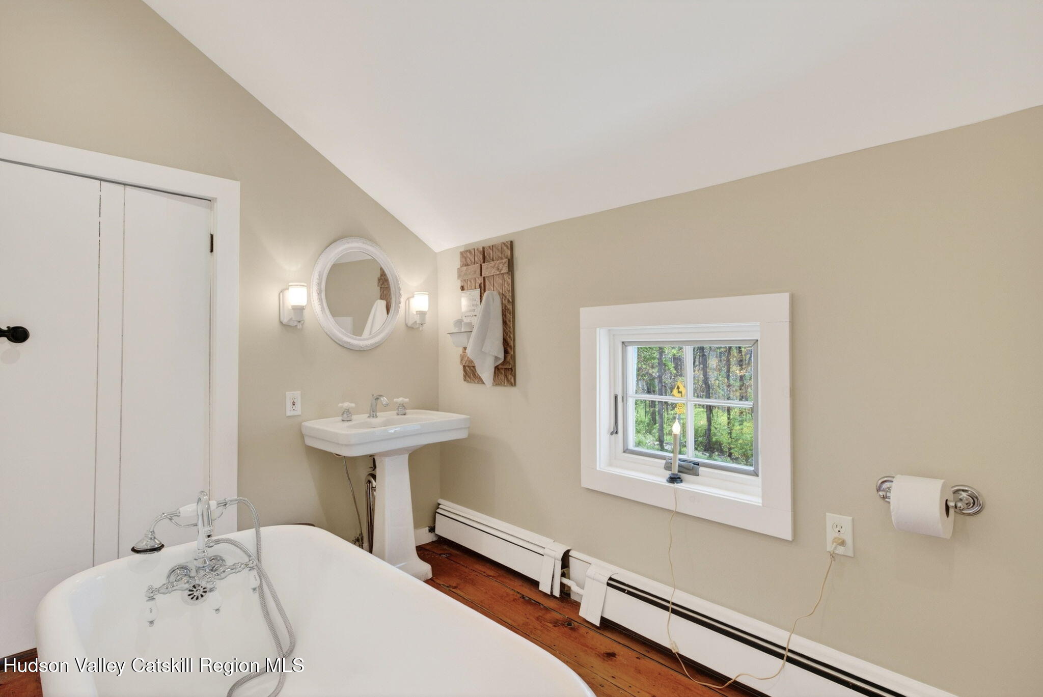 1429 Jackson Corners Road Red Hook, NY 12571 - Photo 29 of 59 a bathroom with a sink and a mirror