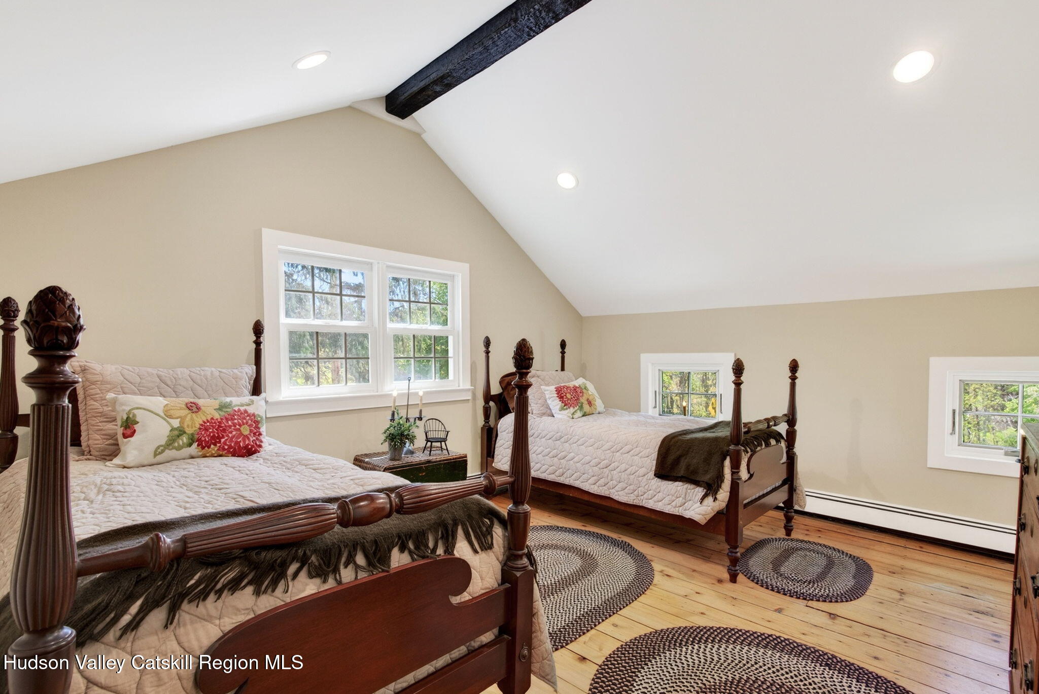 1429 Jackson Corners Road Red Hook, NY 12571 - Photo 30 of 59 a bed room with a bed and a table