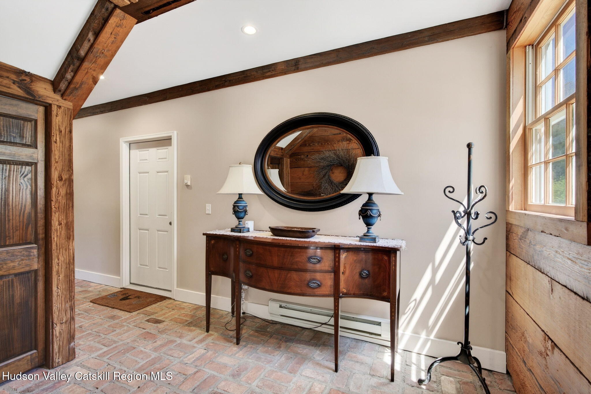 1429 Jackson Corners Road Red Hook, NY 12571 - Photo 36 of 59 a living room with furniture and a painting on the wall