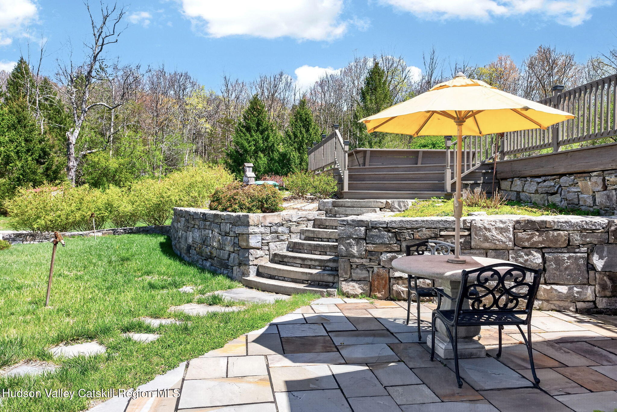 1429 Jackson Corners Road Red Hook, NY 12571 - Photo 41 of 59 a chair and tables in the garden