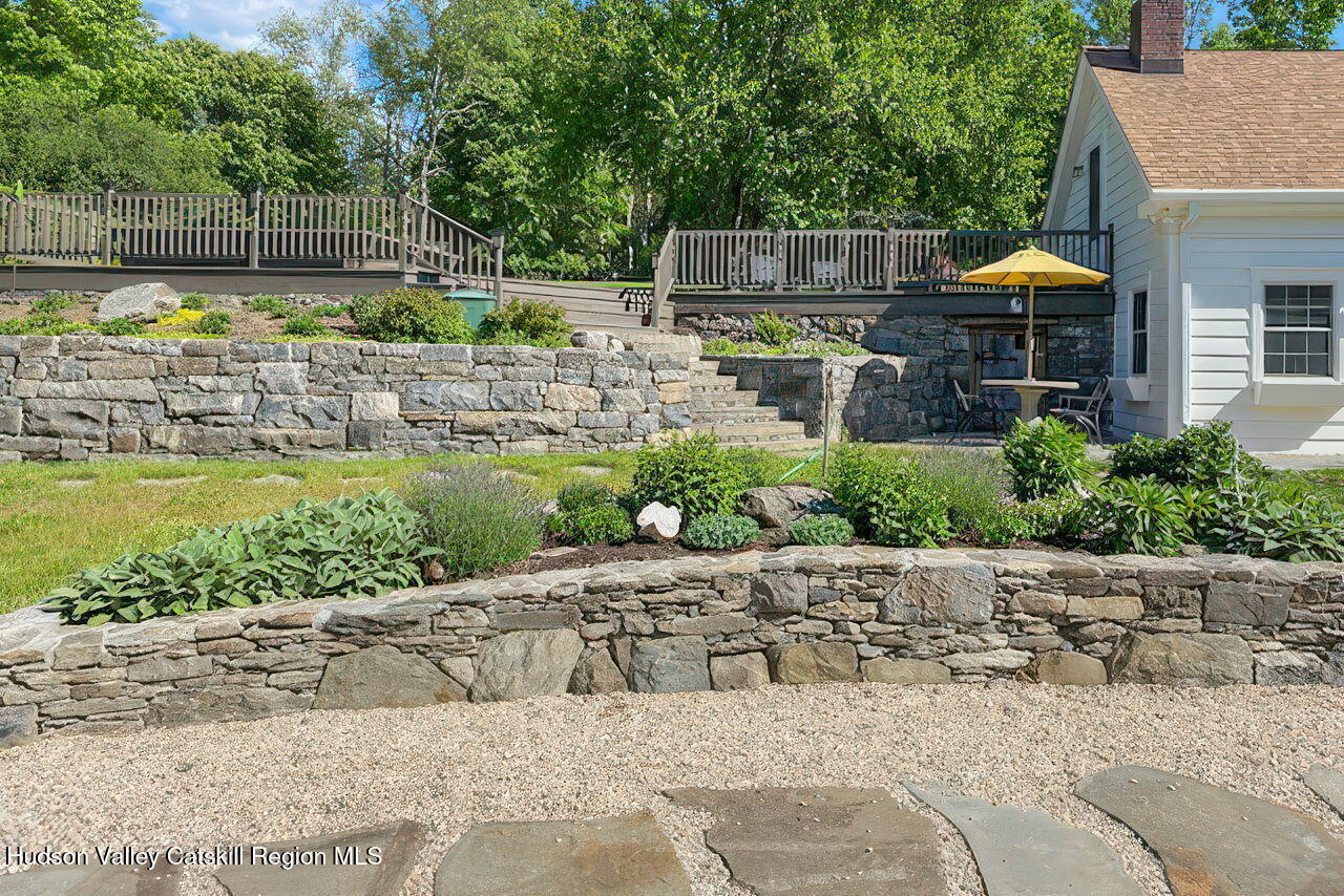1429 Jackson Corners Road Red Hook, NY 12571 - Photo 48 of 59 a backyard of a house with outdoor seating
