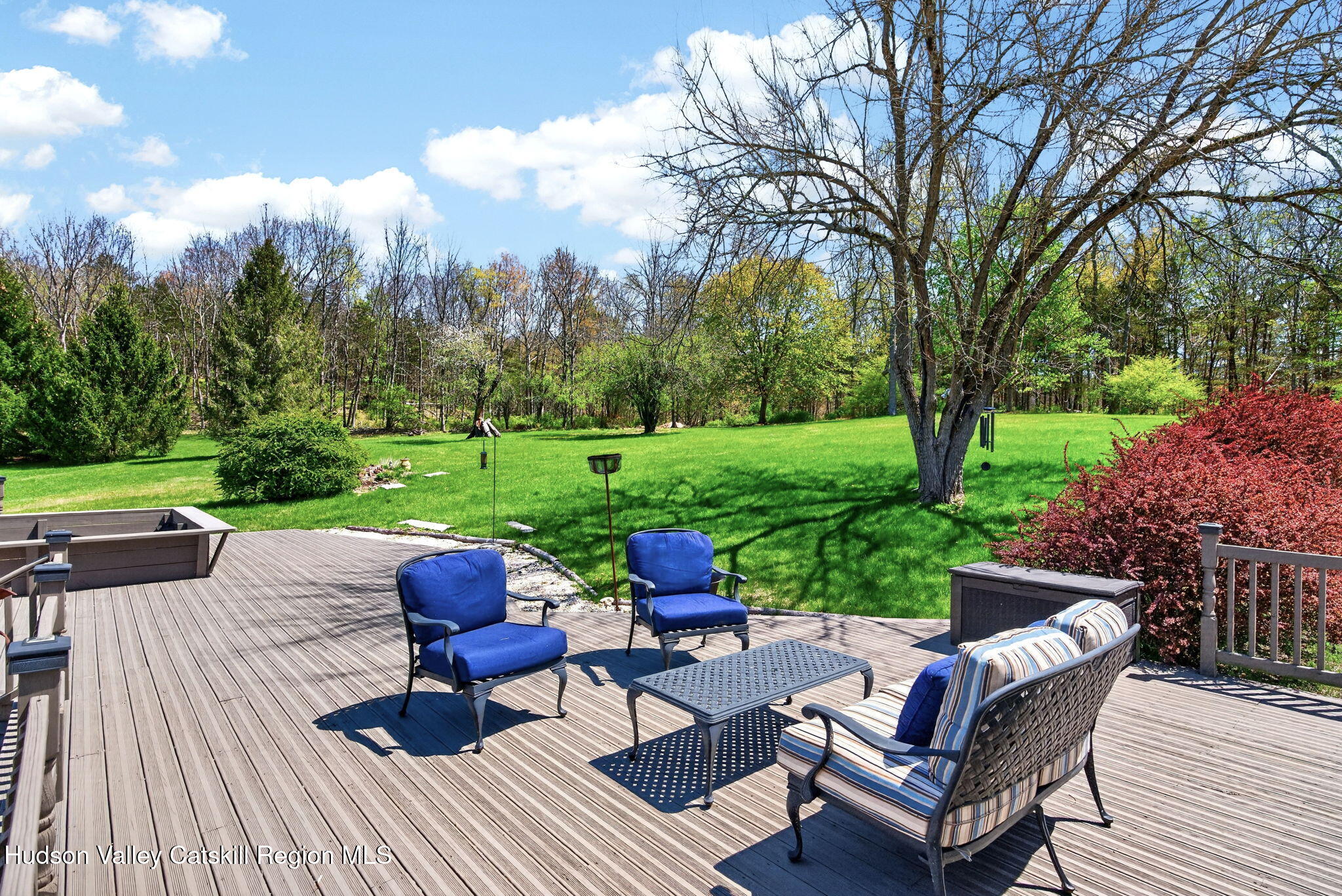 1429 Jackson Corners Road Red Hook, NY 12571 - Photo 55 of 59 a view of a patio with chairs and a yard