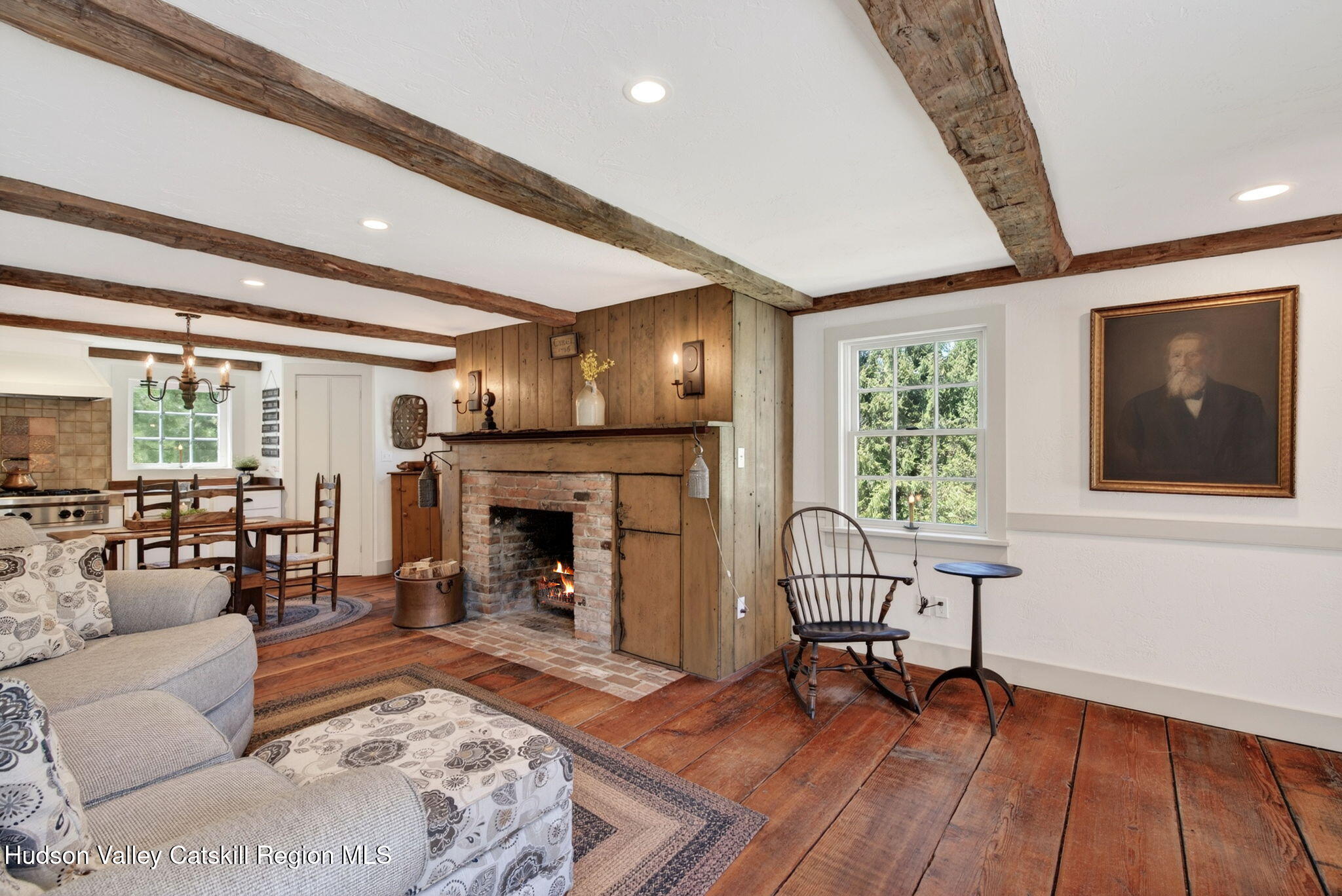 1429 Jackson Corners Road Red Hook, NY 12571 - Photo 8 of 59 a living room with furniture and a fireplace