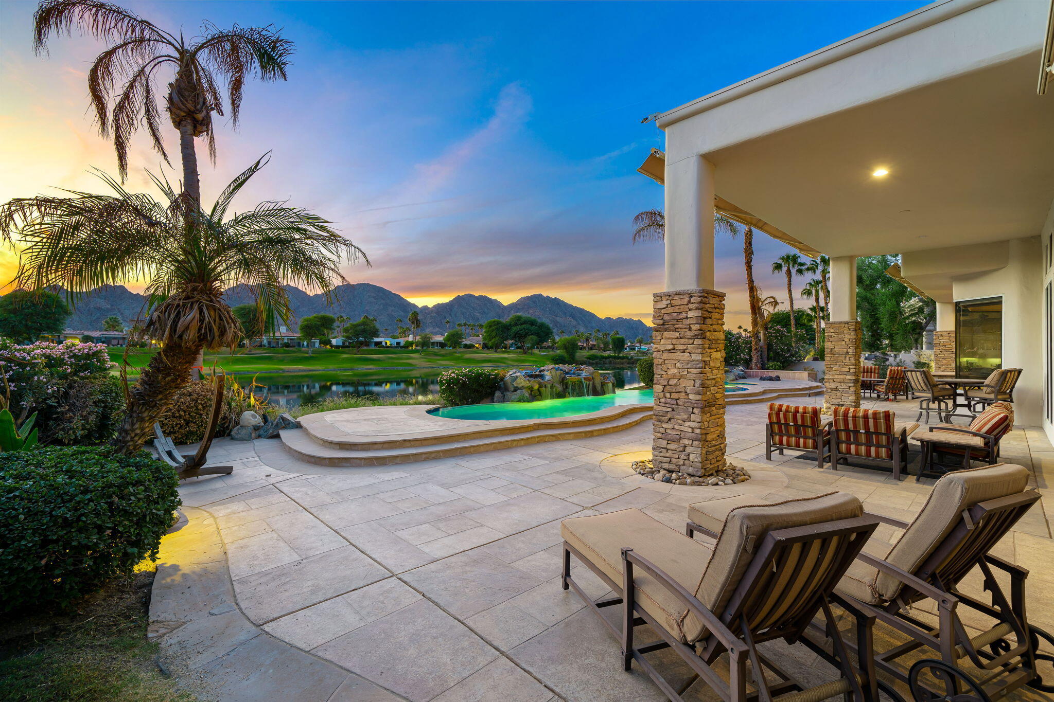 80218 Hermitage La Quinta, CA 92253 - Photo 14 of 92 a view of a patio with a table and chairs