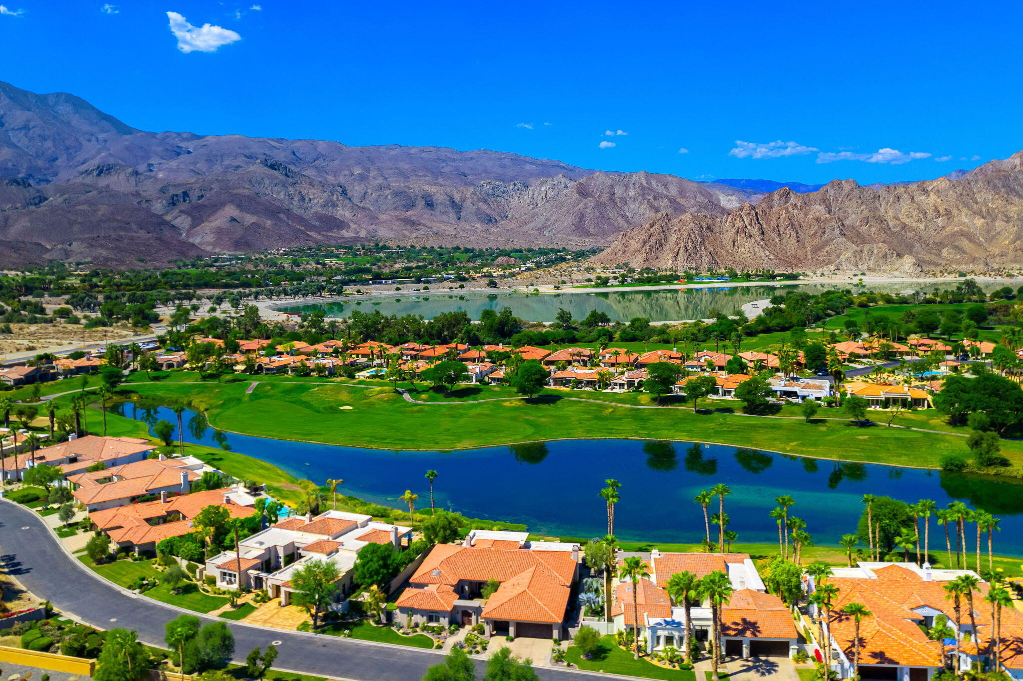 80218 Hermitage La Quinta, CA 92253 - Photo 19 of 92 a view of a house with a yard and a garden