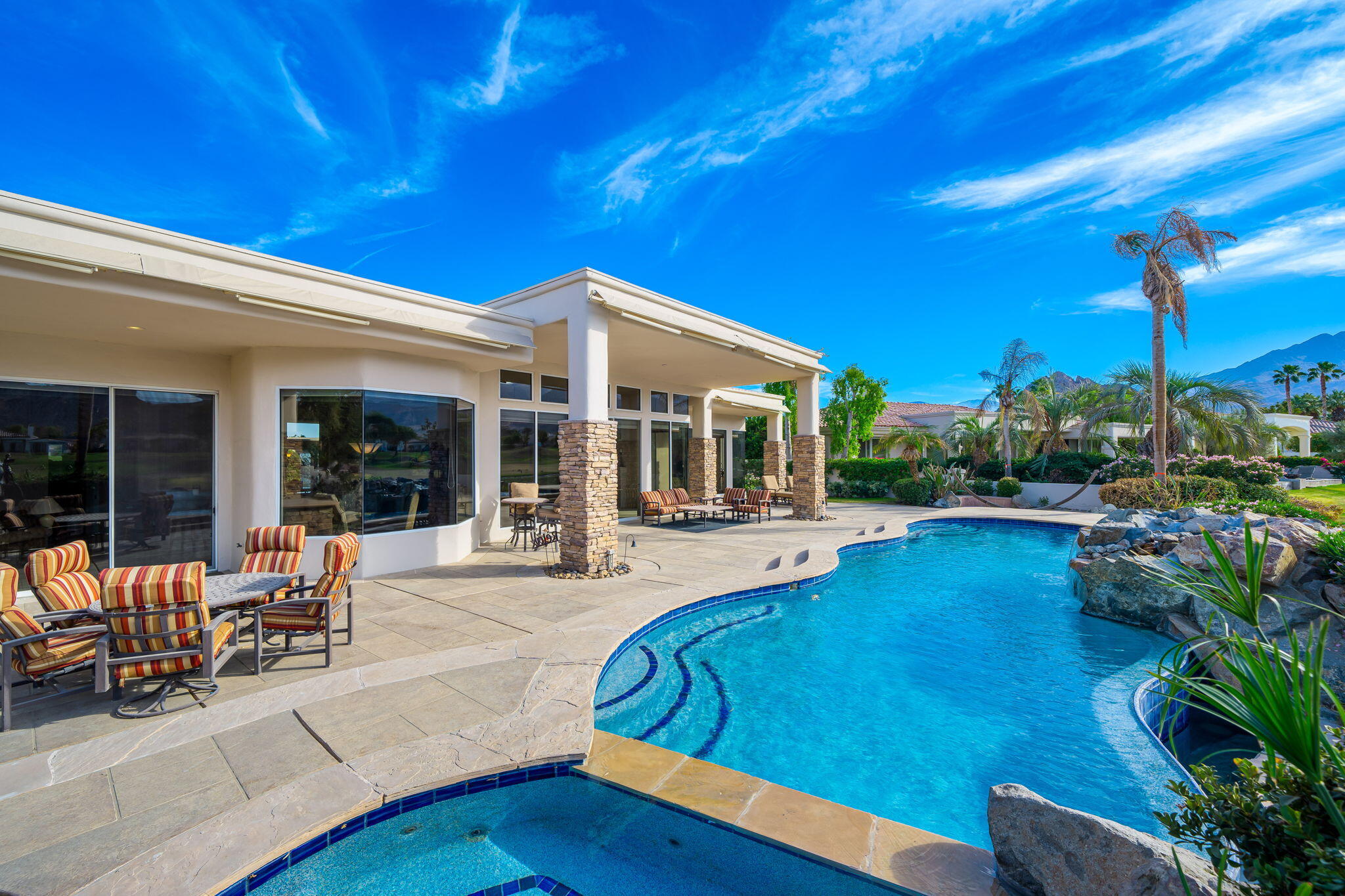 80218 Hermitage La Quinta, CA 92253 - Photo 56 of 92 a view of a house with swimming pool and sitting area