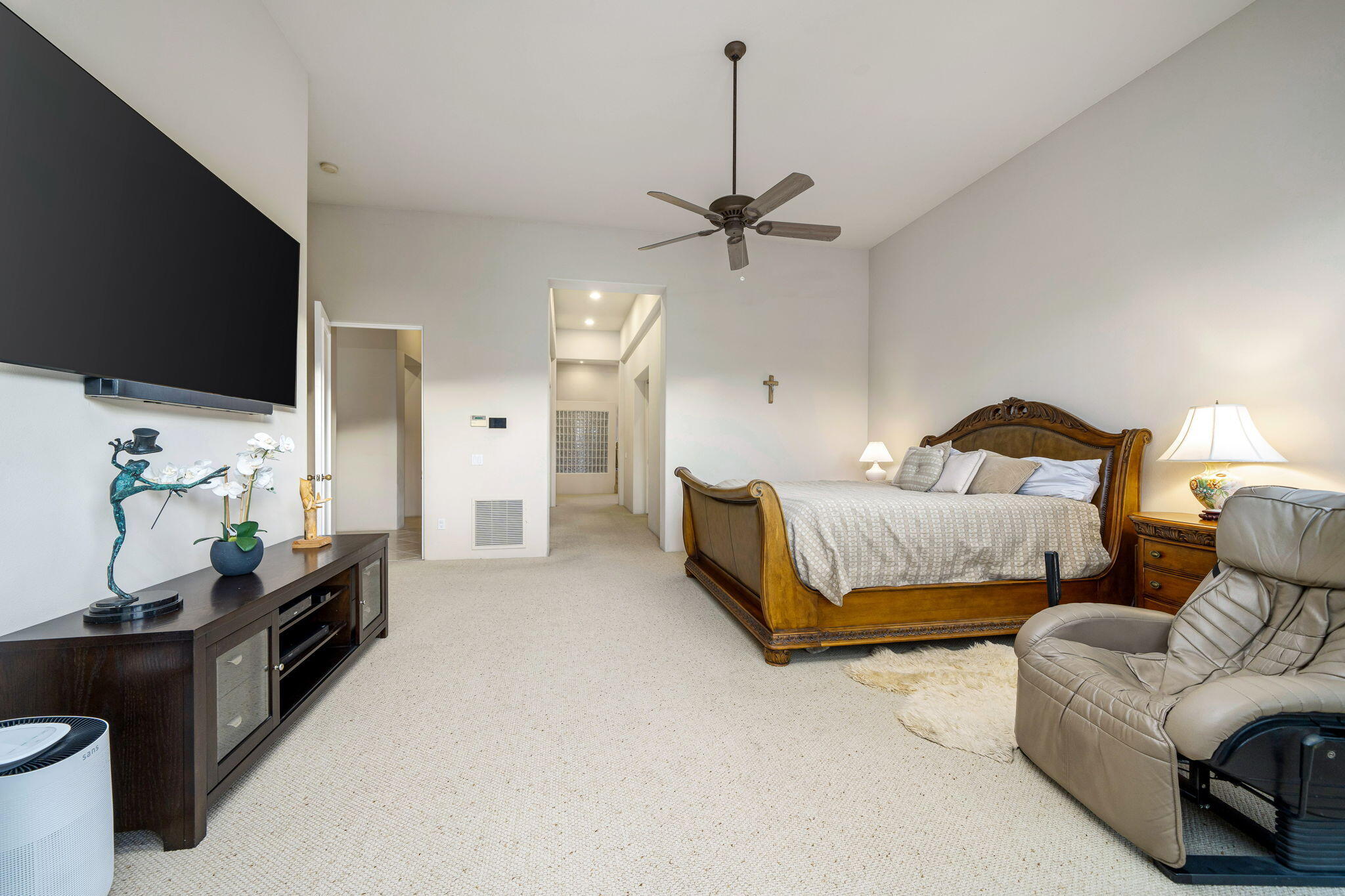 80218 Hermitage La Quinta, CA 92253 - Photo 75 of 92 a bedroom with a bed and a flat screen tv