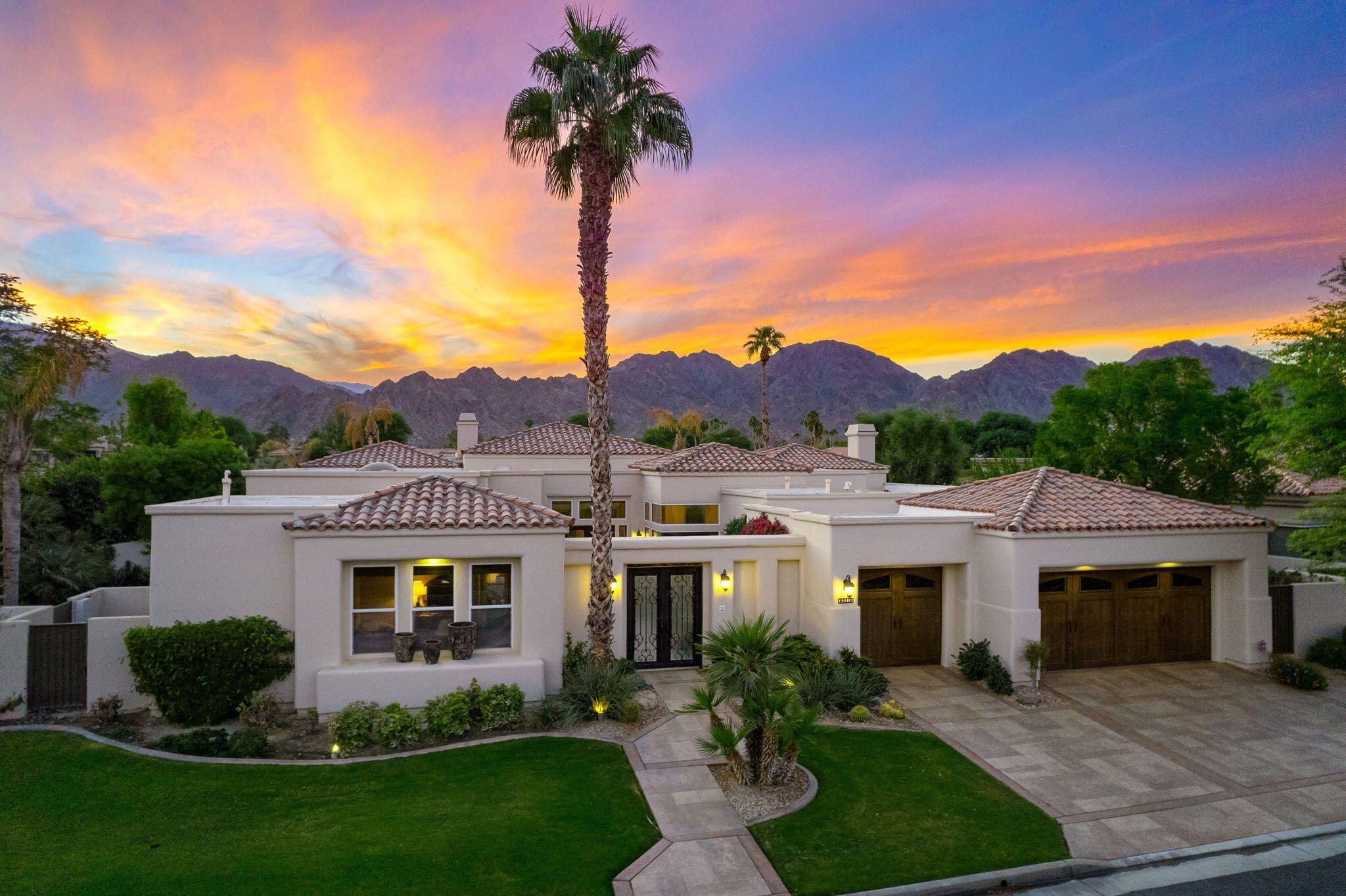 80218 Hermitage La Quinta, CA 92253 - Photo 76 of 92 a front view of a house with a garden and yard