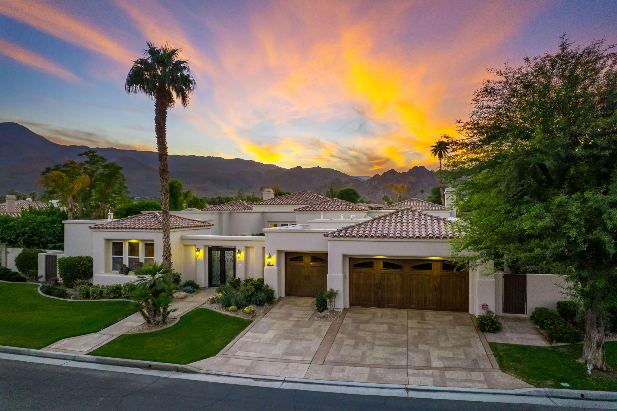 80218 Hermitage La Quinta, CA 92253 - Photo 78 of 92 a front view of a house with garden and plants