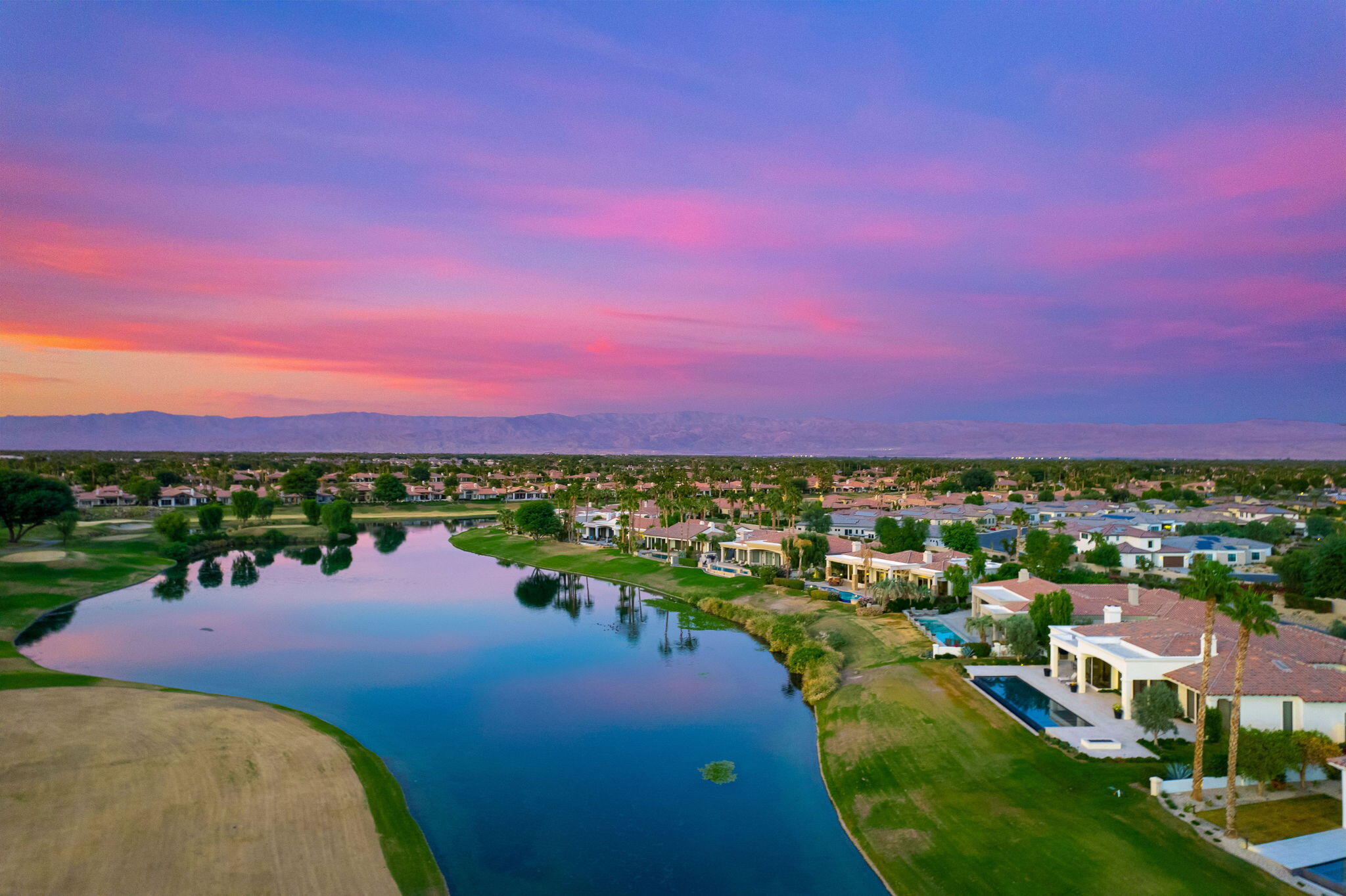 80218 Hermitage La Quinta, CA 92253 - Photo 87 of 92 a view of a lake with a yard