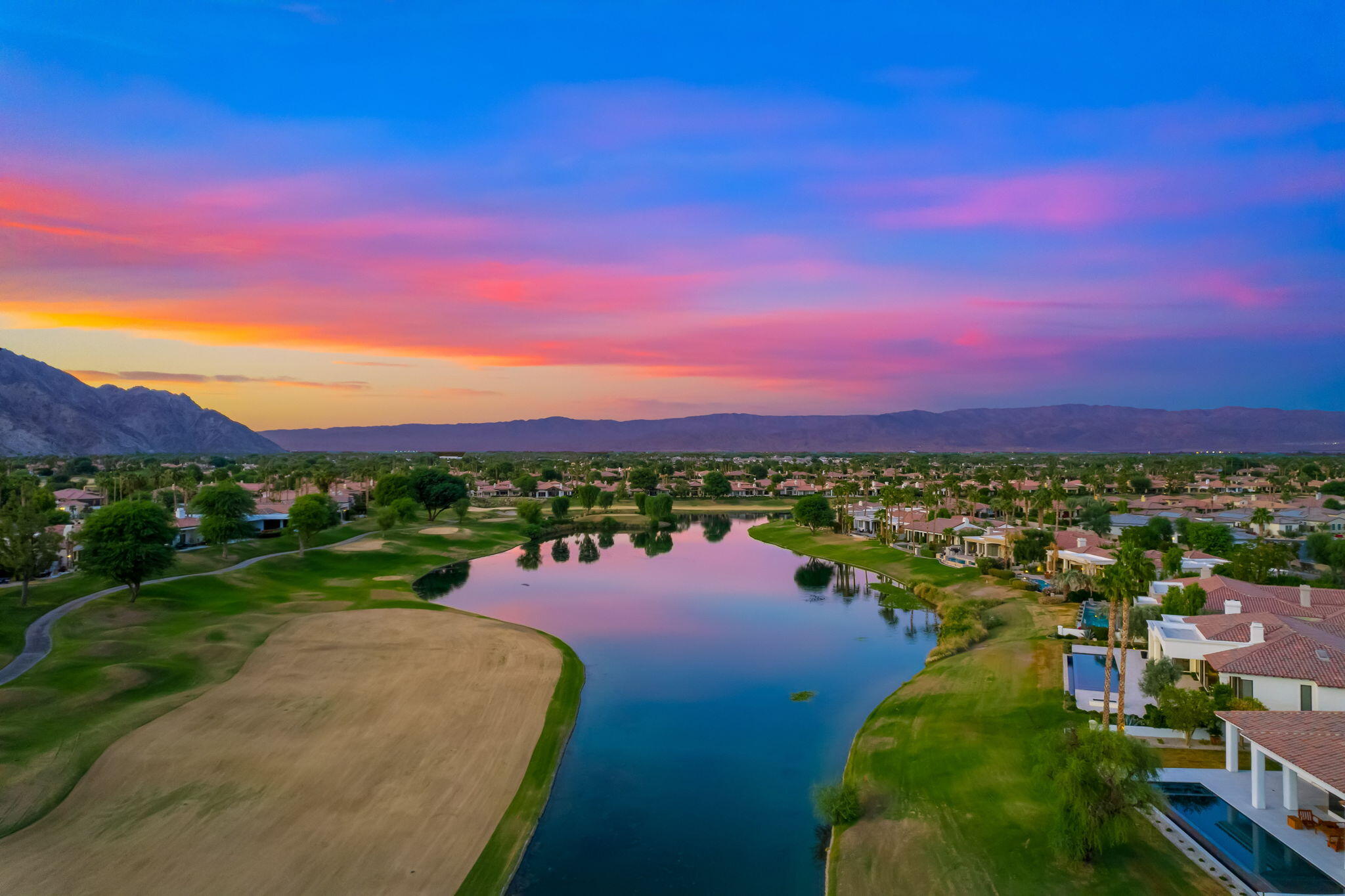 80218 Hermitage La Quinta, CA 92253 - Photo 88 of 92 a view of a lake with a city