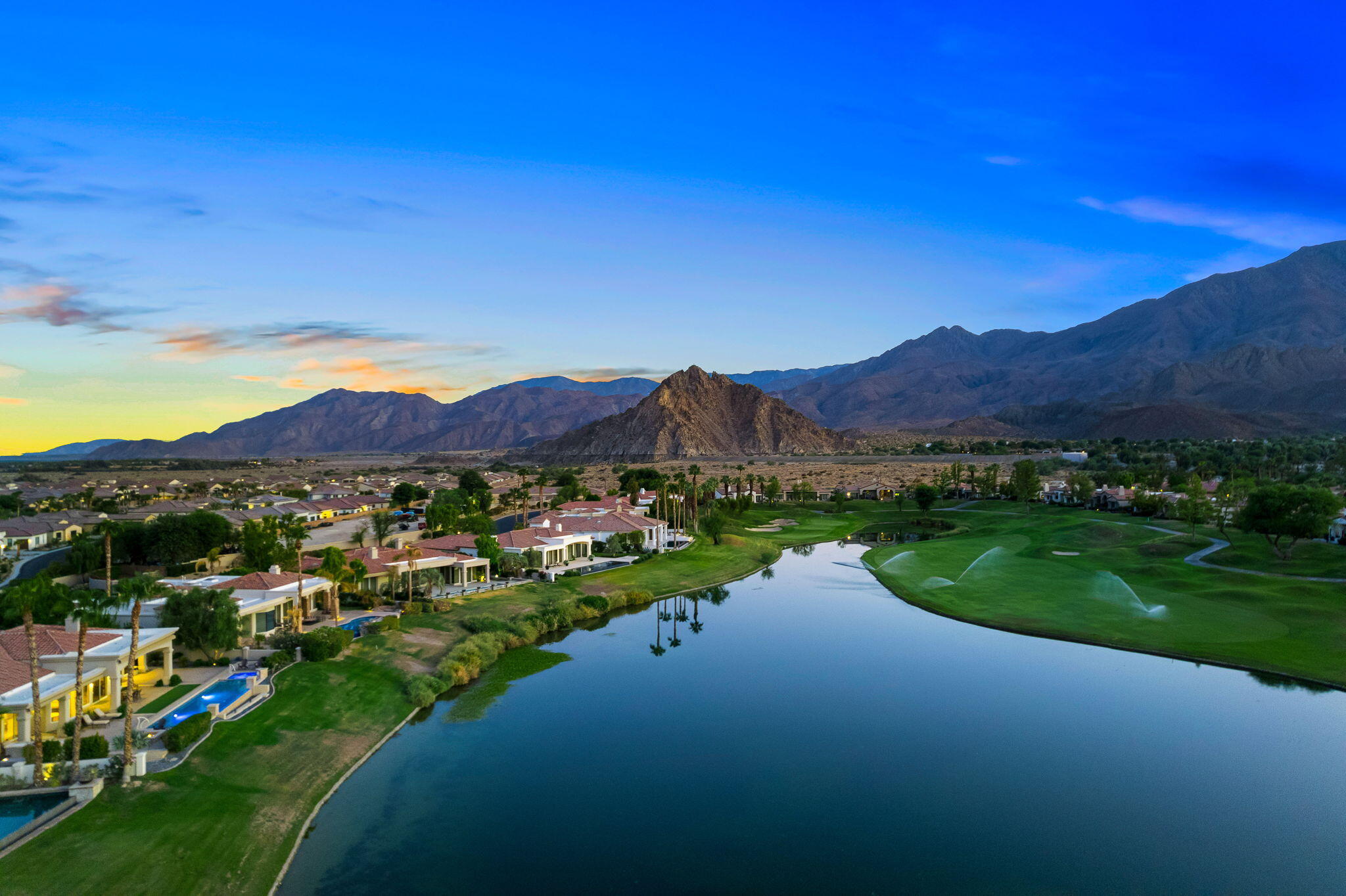 80218 Hermitage La Quinta, CA 92253 - Photo 91 of 92 a view of a lake with a mountain in the background