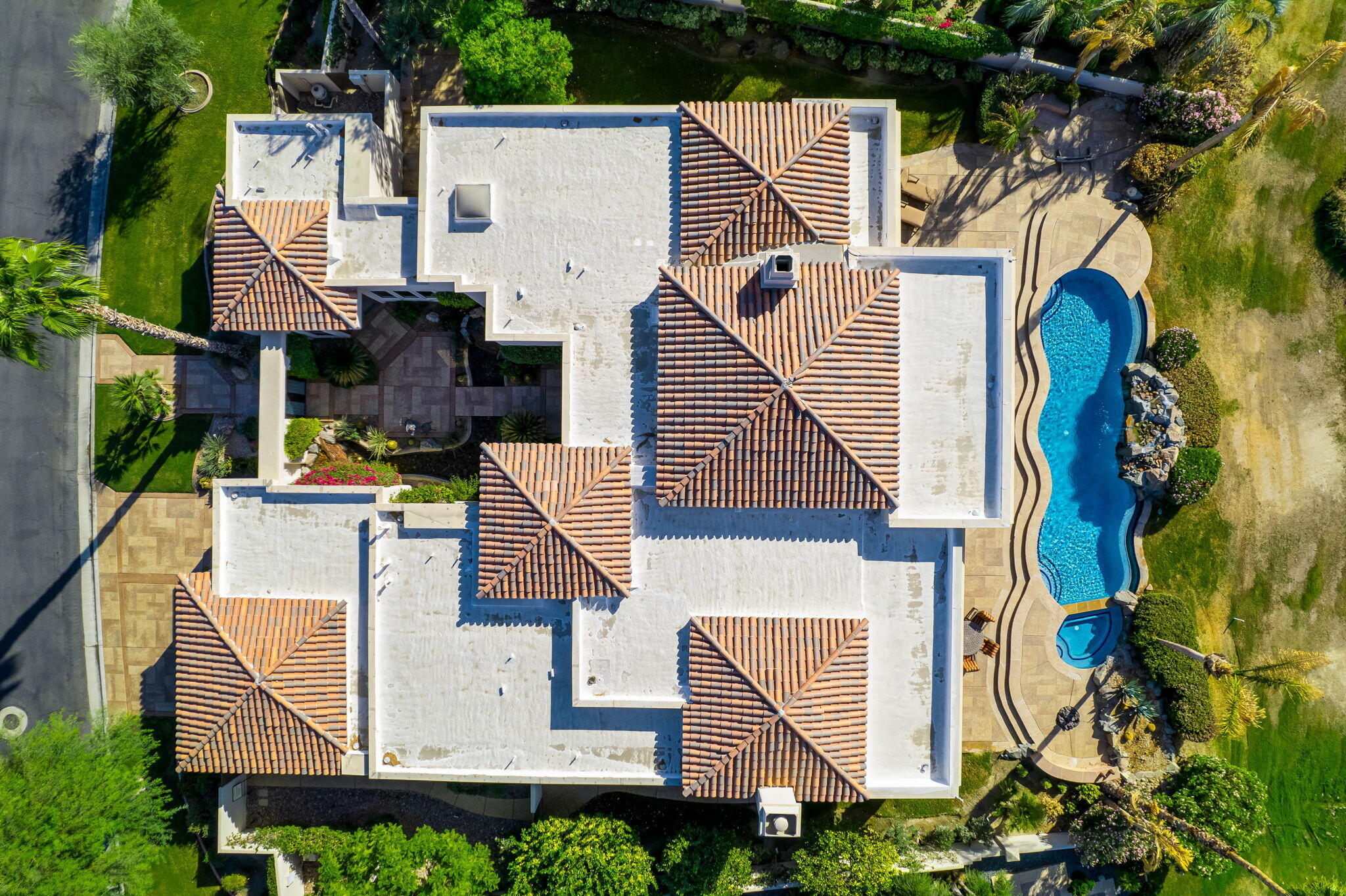 80218 Hermitage La Quinta, CA 92253 - Photo 92 of 92 an aerial view of a house with swimming pool and wooden fence