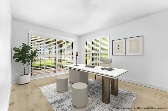 a kitchen with stainless steel appliances kitchen island granite countertop a sink and cabinets