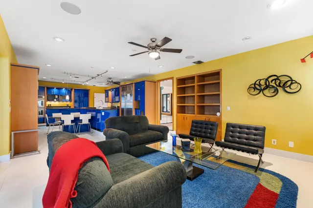 a living room with a couch and a table