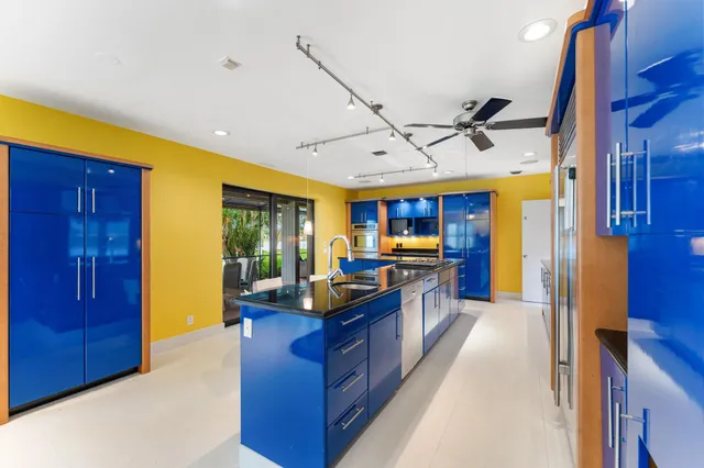 a view of room with window and ceiling fan