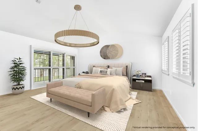 a view of swimming pool with chairs and palm tree