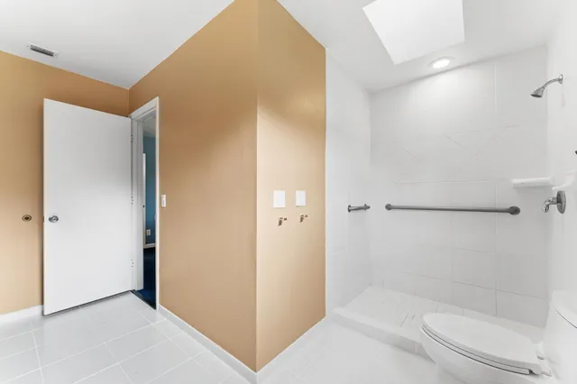 a view of a park with palm trees