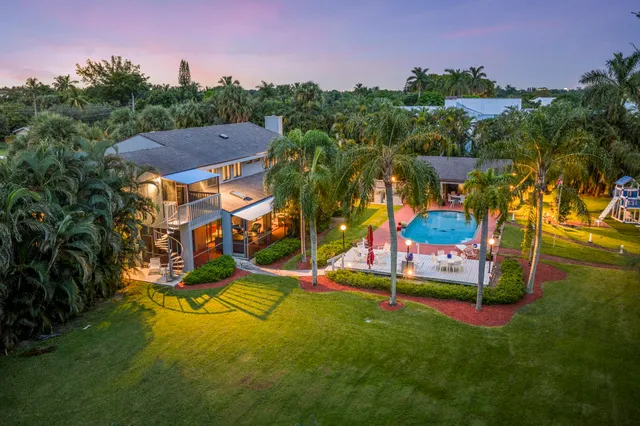 $5,250,000 | 7420 West Lake Drive, Lake Clarke Shores, FL 33406