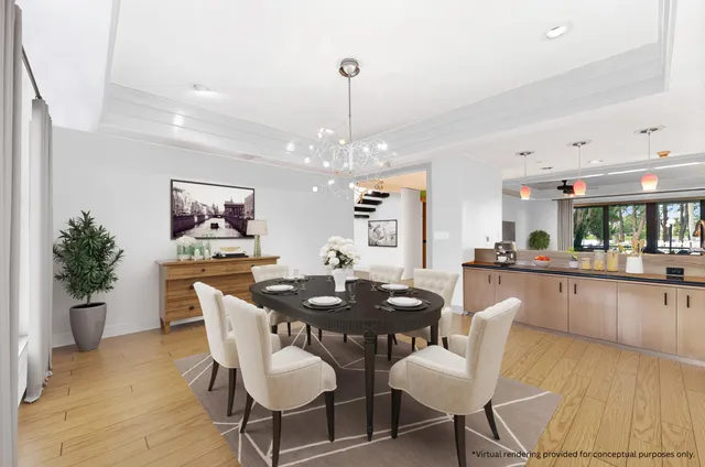 a living room with fireplace furniture and a floor to ceiling window