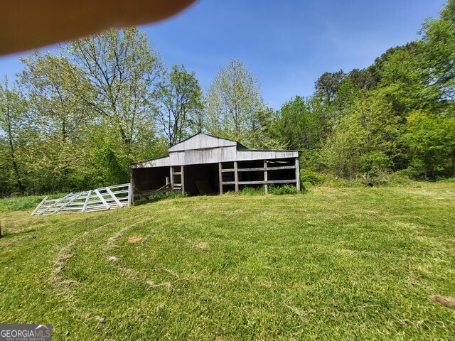 2894 Chase Road Cornelia, GA 30531 - Photo 139 of 142 a front view of a house with a garden
