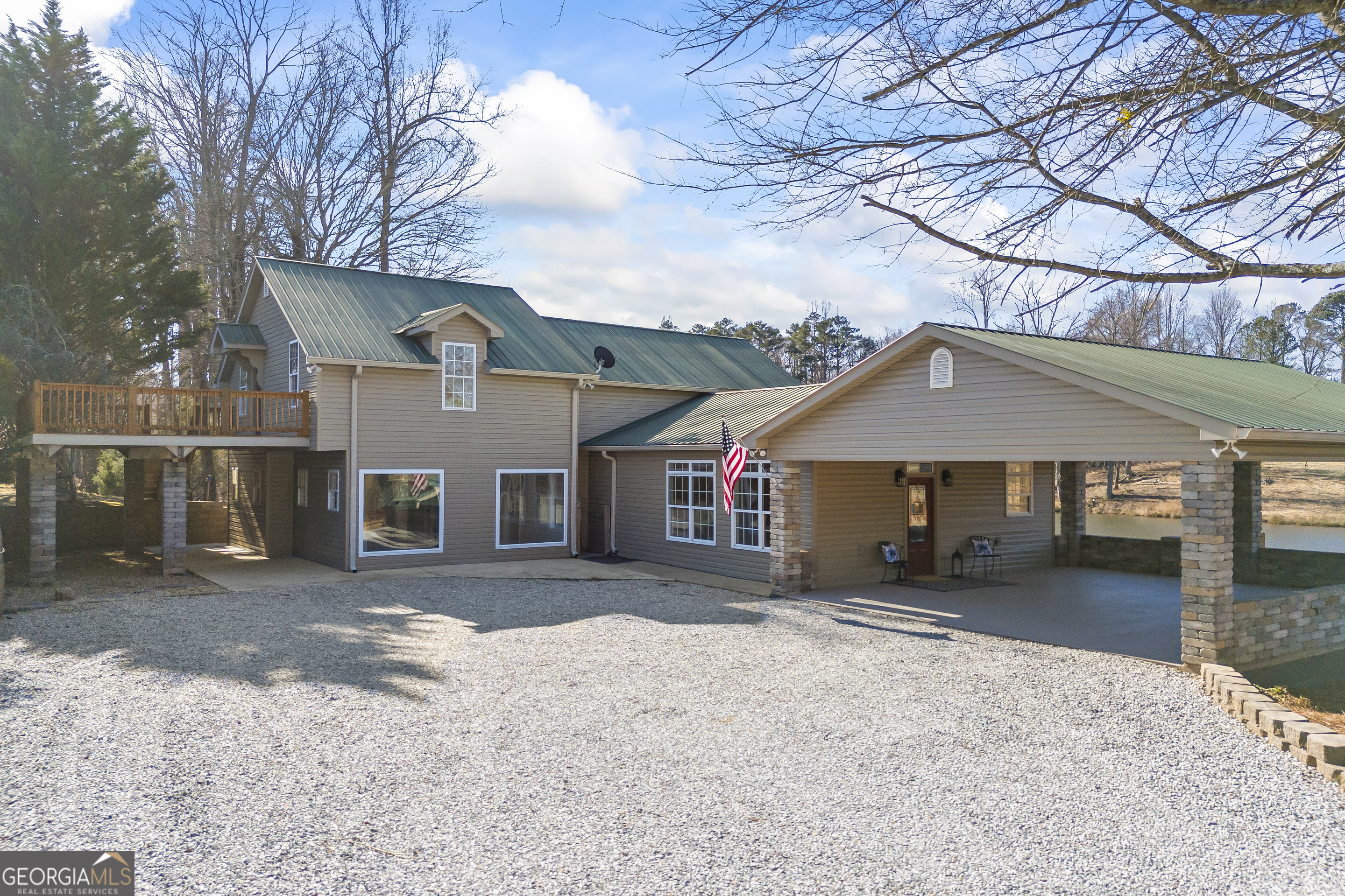 2894 Chase Road Cornelia, GA 30531 - Photo 26 of 142 a front view of a house with a yard and garage