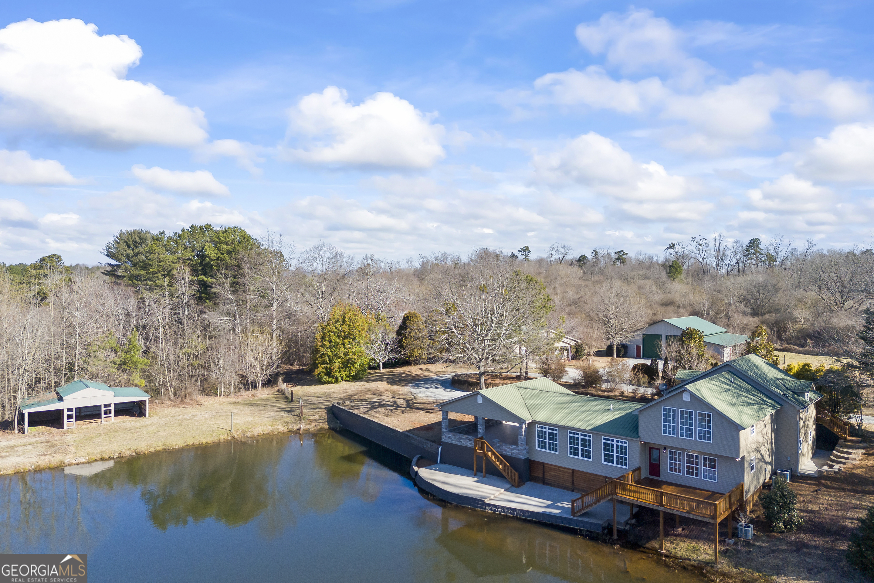 2894 Chase Road Cornelia, GA 30531 - Photo 28 of 142 a view of a lake with couches