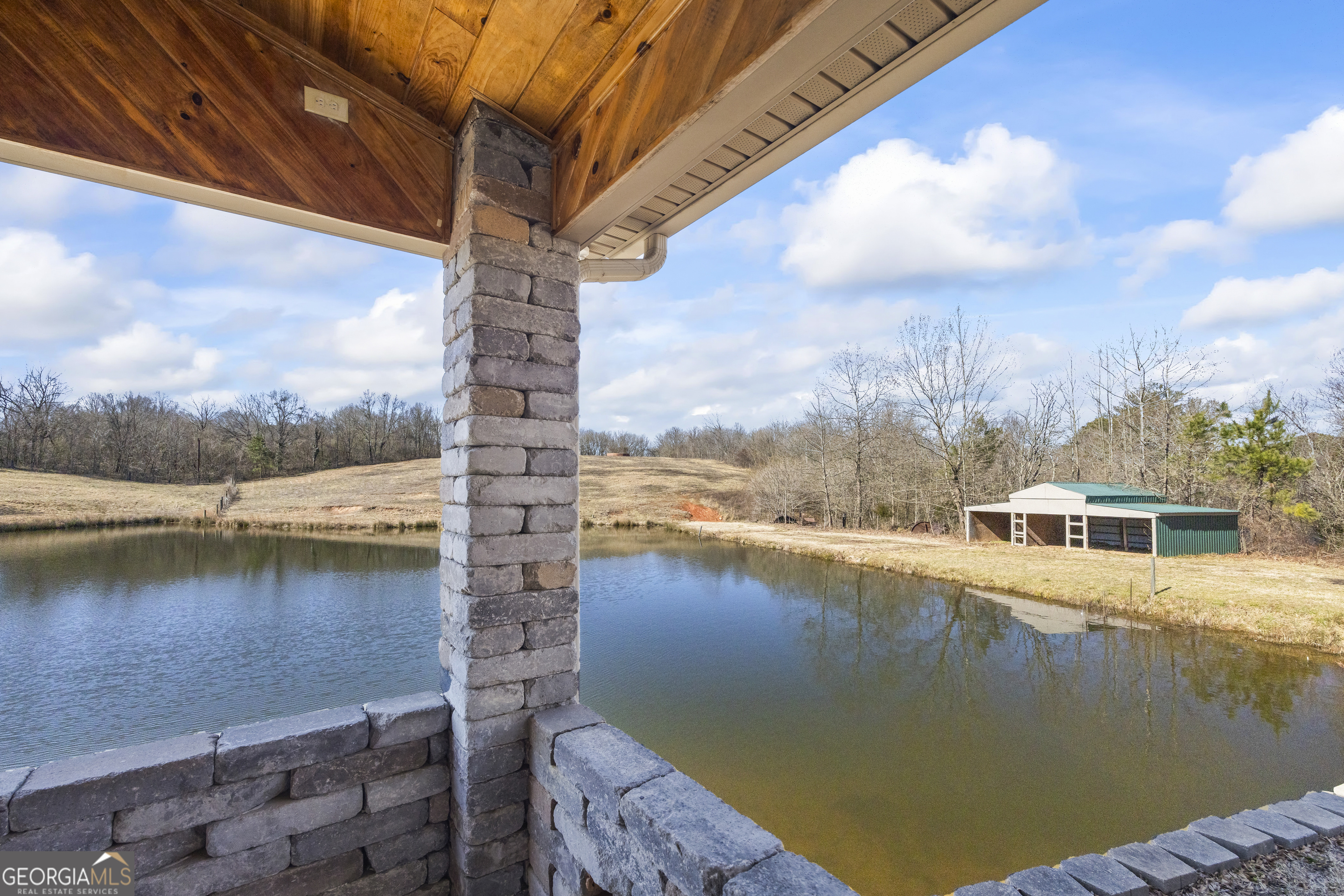 2894 Chase Road Cornelia, GA 30531 - Photo 33 of 142 a view of a lake with a house