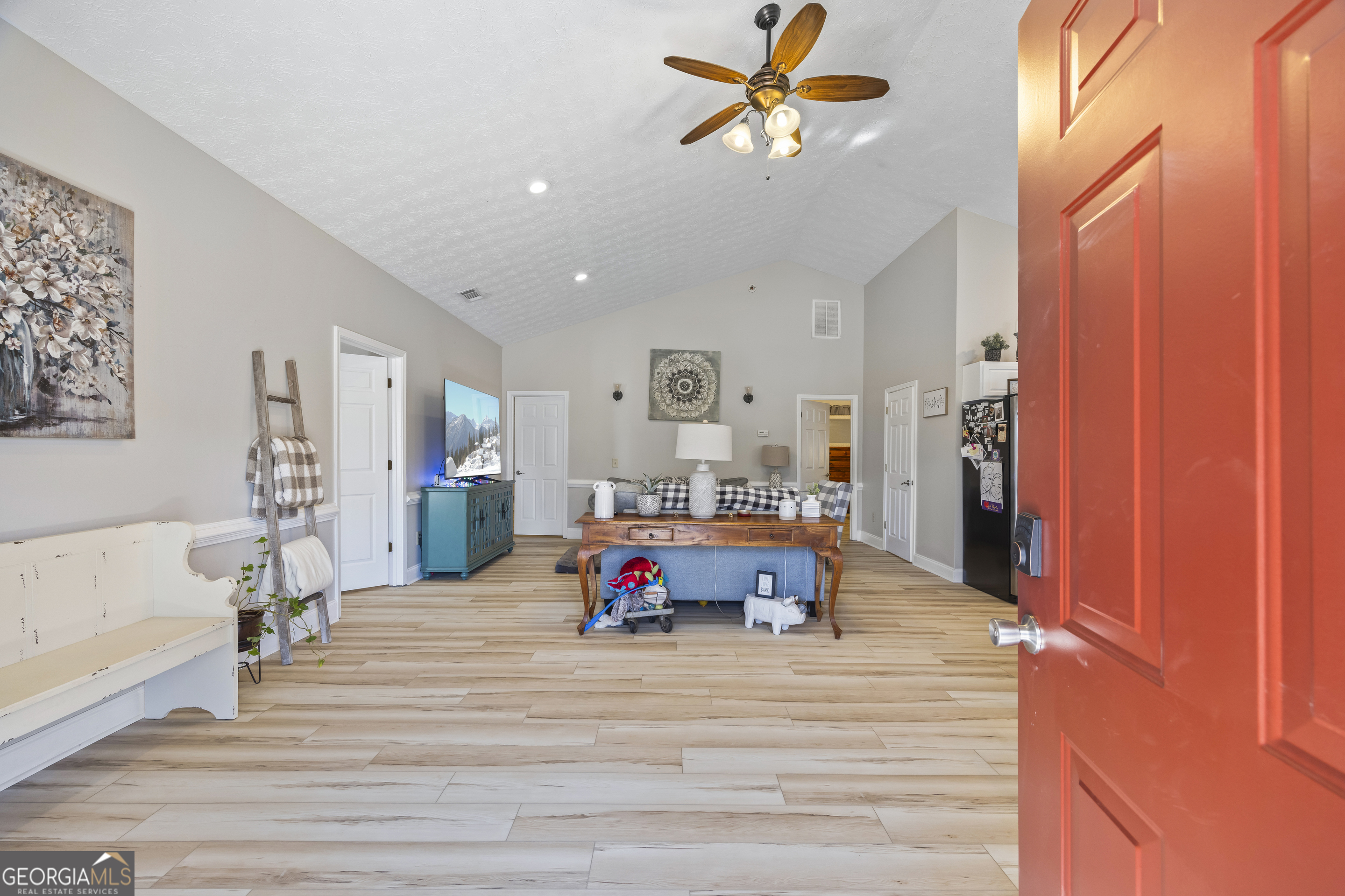 2894 Chase Road Cornelia, GA 30531 - Photo 94 of 142 a living room with furniture and a wooden floor