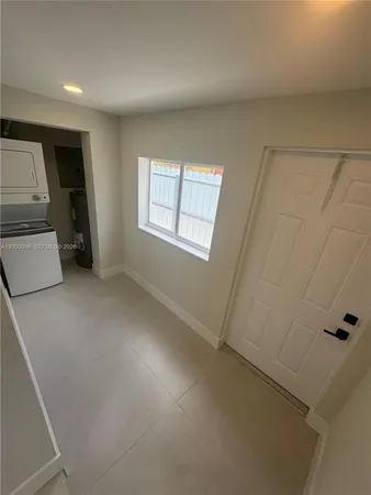 a view of a hallway with windows