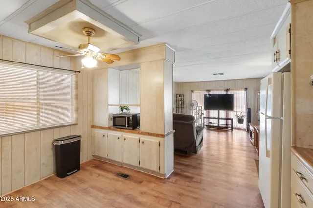 a view of living room with furniture and flat screen tv